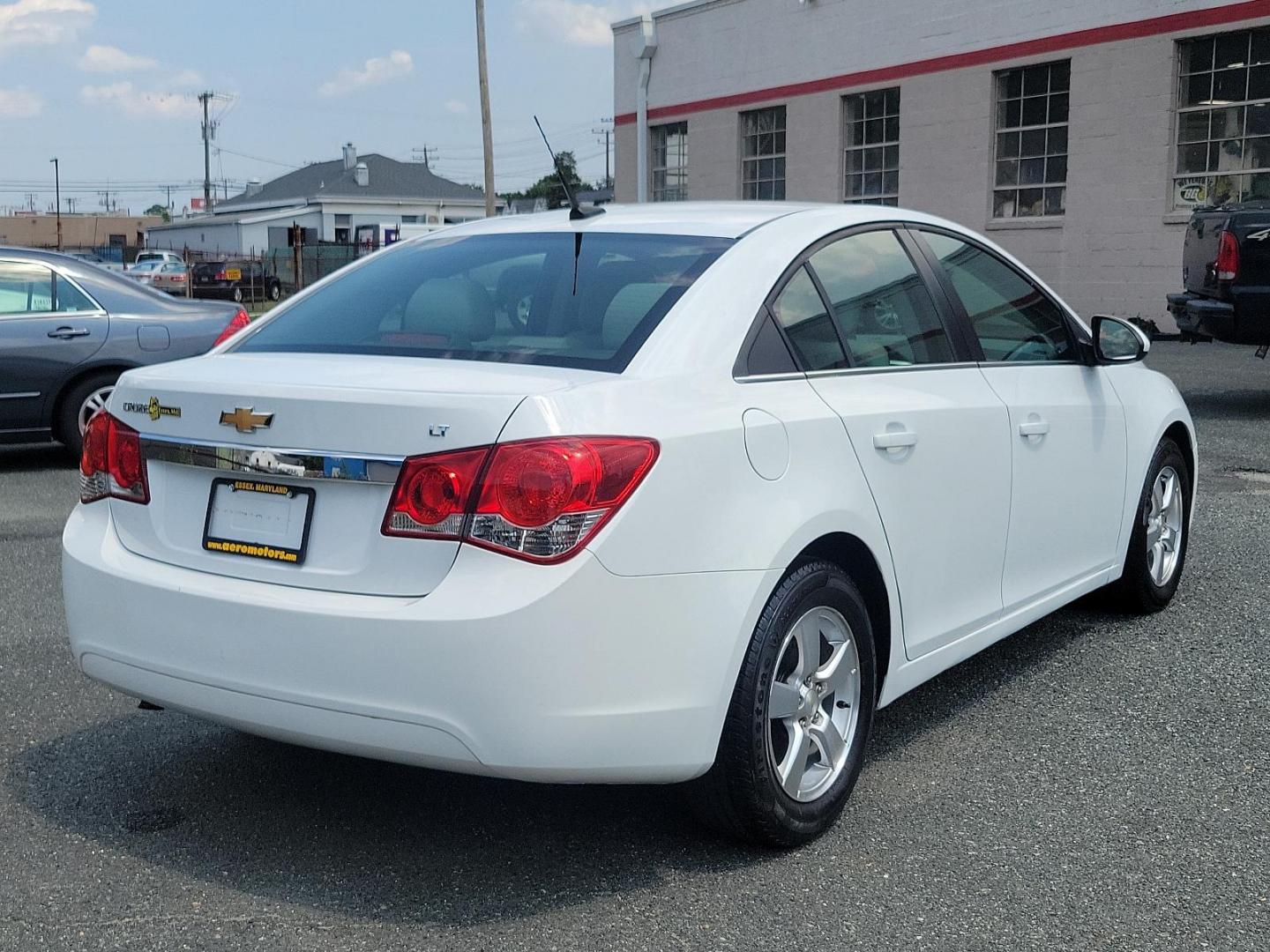 2011 Summit White - GAZ /Medium Titanium - AFC Chevrolet Cruze LT w/1LT (1G1PF5S90B7) with an ENGINE, ECOTEC TURBO 1.4L VARIABLE VALVE TIMING DOHC 4-CYLINDER SEQUENTIAL MFI, TURBO engine, located at 50 Eastern Blvd., Essex, MD, 21221, (410) 686-3444, 39.304367, -76.484947 - Experience unmatched performance and style with this 2011 Chevrolet Cruze LT w/1LT 4dr sdn lt w/1lt. Boasting a sleek summit white exterior coupled with a medium titanium interior, this vehicle exudes contemporary elegance. Under the hood, it is powered by an ecotec turbo 1.4l variable valve timing - Photo#5