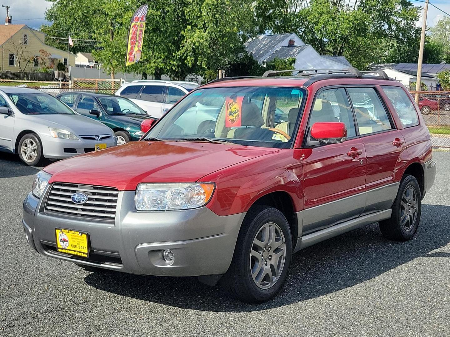 2007 Garnet Red Pearl - RE1 /Beige - BGE Subaru Forester X L.L. Bean Ed (JF1SG67637H) with an 2.5L SOHC SMPI 16-valve 4-cyl boxer engine engine, located at 50 Eastern Blvd., Essex, MD, 21221, (410) 686-3444, 39.304367, -76.484947 - Experience the fusion of class, style, and performance with this 2007 Subaru Forester X L.L. Bean Edition. Boasting a striking garnet red pearl exterior, this all-wheel-drive 4-door SUV is designed to make a statement. At the heart of this beauty lies a 2.5L SOHC SMPI 16-valve 4-cylinder boxer engin - Photo#2