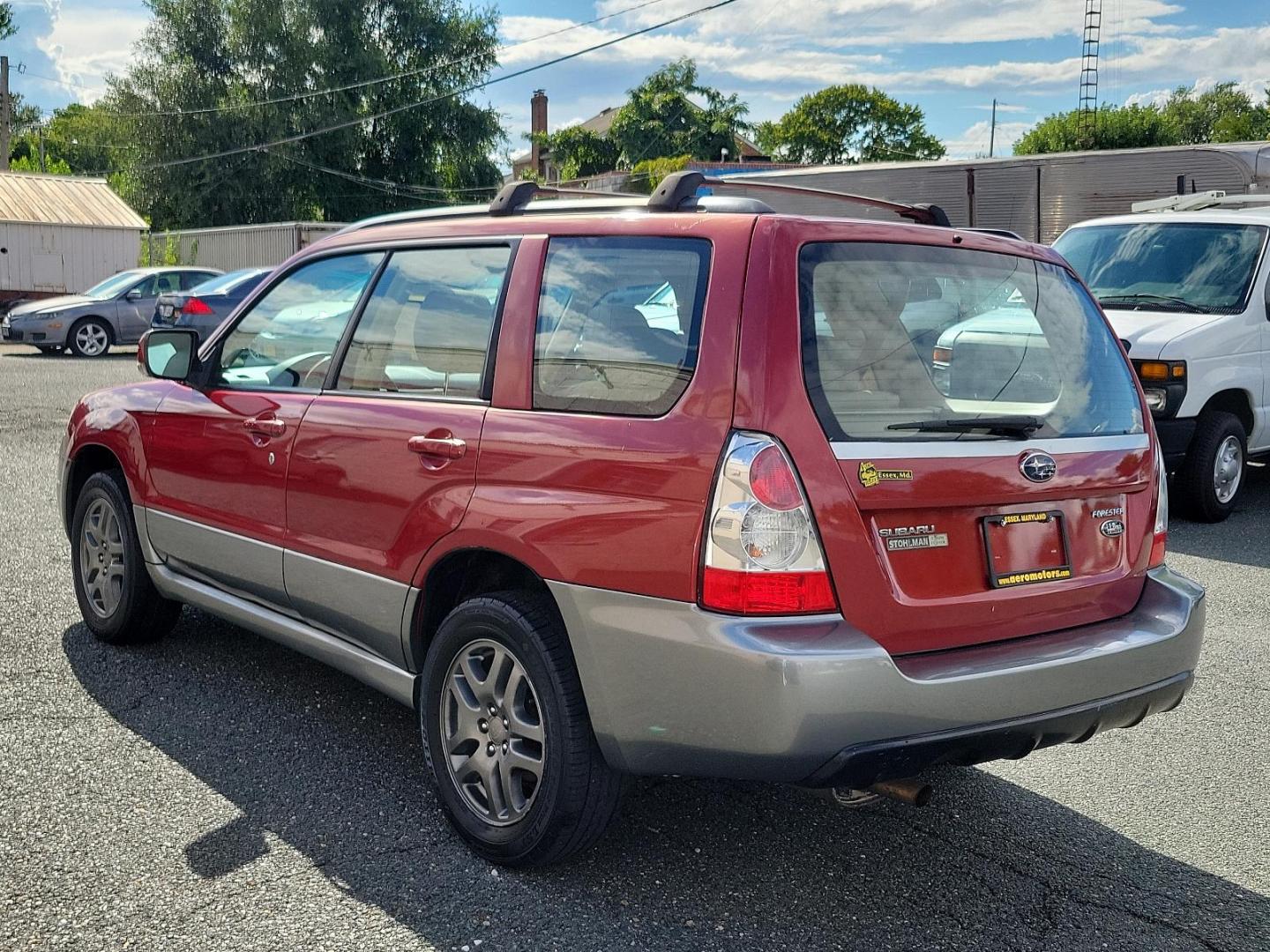 2007 Garnet Red Pearl - RE1 /Beige - BGE Subaru Forester X L.L. Bean Ed (JF1SG67637H) with an 2.5L SOHC SMPI 16-valve 4-cyl boxer engine engine, located at 50 Eastern Blvd., Essex, MD, 21221, (410) 686-3444, 39.304367, -76.484947 - Experience the fusion of class, style, and performance with this 2007 Subaru Forester X L.L. Bean Edition. Boasting a striking garnet red pearl exterior, this all-wheel-drive 4-door SUV is designed to make a statement. At the heart of this beauty lies a 2.5L SOHC SMPI 16-valve 4-cylinder boxer engin - Photo#3