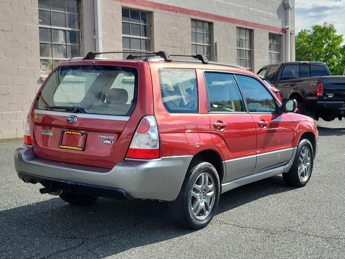 2007 Garnet Red Pearl - RE1 /Beige - BGE Subaru Forester X L.L. Bean Ed (JF1SG67637H) with an 2.5L SOHC SMPI 16-valve 4-cyl boxer engine engine, located at 50 Eastern Blvd., Essex, MD, 21221, (410) 686-3444, 39.304367, -76.484947 - Experience the fusion of class, style, and performance with this 2007 Subaru Forester X L.L. Bean Edition. Boasting a striking garnet red pearl exterior, this all-wheel-drive 4-door SUV is designed to make a statement. At the heart of this beauty lies a 2.5L SOHC SMPI 16-valve 4-cylinder boxer engin - Photo#5