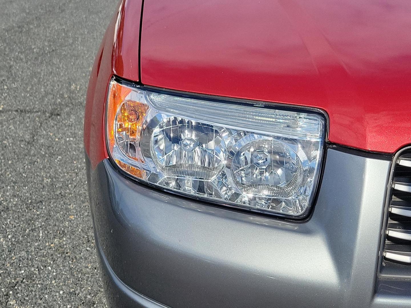 2007 Garnet Red Pearl - RE1 /Beige - BGE Subaru Forester X L.L. Bean Ed (JF1SG67637H) with an 2.5L SOHC SMPI 16-valve 4-cyl boxer engine engine, located at 50 Eastern Blvd., Essex, MD, 21221, (410) 686-3444, 39.304367, -76.484947 - Experience the fusion of class, style, and performance with this 2007 Subaru Forester X L.L. Bean Edition. Boasting a striking garnet red pearl exterior, this all-wheel-drive 4-door SUV is designed to make a statement. At the heart of this beauty lies a 2.5L SOHC SMPI 16-valve 4-cylinder boxer engin - Photo#8