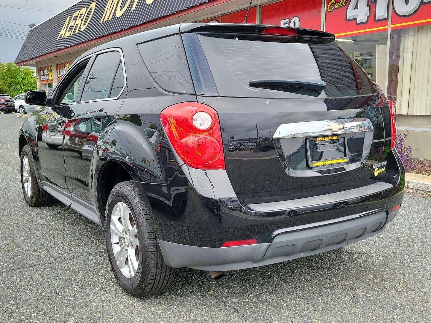 2013 Black - GBA /Light Titanium/Jet Black - AFI Chevrolet Equinox LS (2GNALBEK5D1) with an ENGINE, 2.4L DOHC 4-CYLINDER SIDI (SPARK IGNITION DIRECT INJECTION) engine, located at 50 Eastern Blvd., Essex, MD, 21221, (410) 686-3444, 39.304367, -76.484947 - Discover the perfect blend of style and efficiency with this stunning 2013 Chevrolet Equinox LS FWD 4dr LS. Dressed in an eye-catching black exterior which perfectly accents the luxurious light titanium/jet black interior, this beauty is sure to make heads turn. Under the hood, you'll find a powerfu - Photo#3