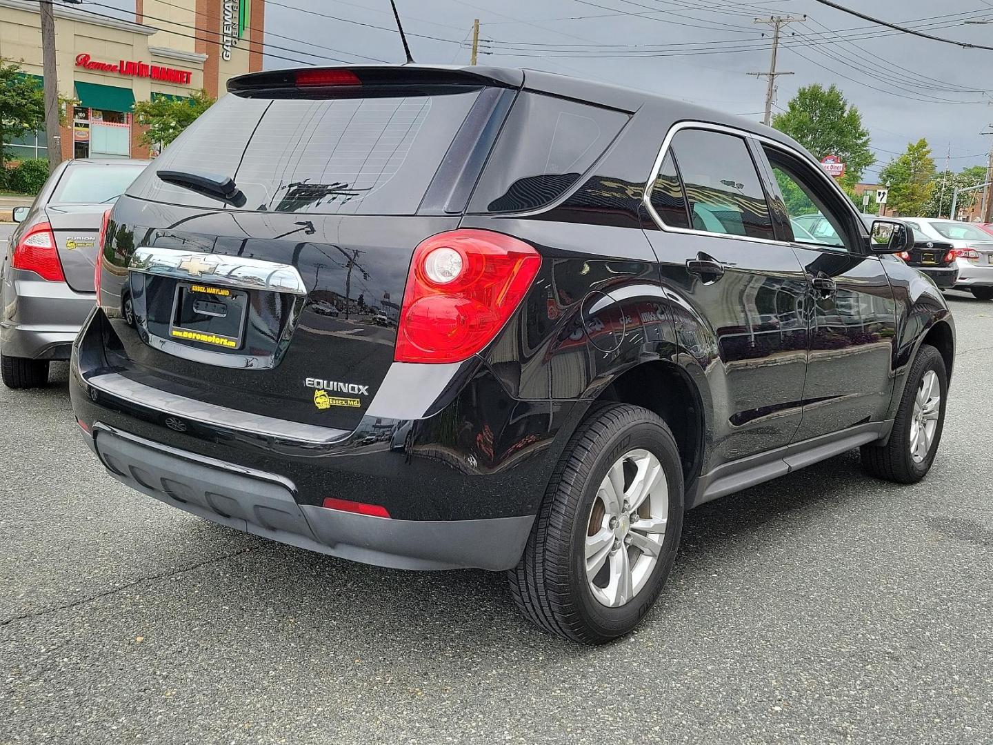 2013 Black - GBA /Light Titanium/Jet Black - AFI Chevrolet Equinox LS (2GNALBEK5D1) with an ENGINE, 2.4L DOHC 4-CYLINDER SIDI (SPARK IGNITION DIRECT INJECTION) engine, located at 50 Eastern Blvd., Essex, MD, 21221, (410) 686-3444, 39.304367, -76.484947 - Discover the perfect blend of style and efficiency with this stunning 2013 Chevrolet Equinox LS FWD 4dr LS. Dressed in an eye-catching black exterior which perfectly accents the luxurious light titanium/jet black interior, this beauty is sure to make heads turn. Under the hood, you'll find a powerfu - Photo#5