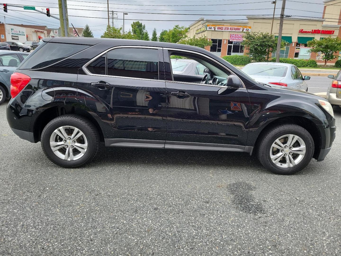 2013 Black - GBA /Light Titanium/Jet Black - AFI Chevrolet Equinox LS (2GNALBEK5D1) with an ENGINE, 2.4L DOHC 4-CYLINDER SIDI (SPARK IGNITION DIRECT INJECTION) engine, located at 50 Eastern Blvd., Essex, MD, 21221, (410) 686-3444, 39.304367, -76.484947 - Discover the perfect blend of style and efficiency with this stunning 2013 Chevrolet Equinox LS FWD 4dr LS. Dressed in an eye-catching black exterior which perfectly accents the luxurious light titanium/jet black interior, this beauty is sure to make heads turn. Under the hood, you'll find a powerfu - Photo#6