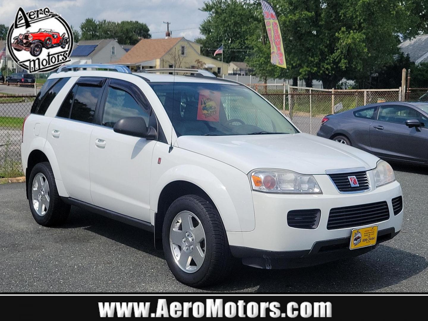 2007 Polar White - 50U /Gray - 17 Saturn VUE V6 (5GZCZ63477S) with an 3.5L SOHC MFI 24-VALVE V6 ENGINE engine, located at 50 Eastern Blvd., Essex, MD, 21221, (410) 686-3444, 39.304367, -76.484947 - Discover the elegance and comfort of the 2007 Saturn VUE V6 AWD 4dr V6 Auto. Dressed in a sophisticated Polar White exterior, this luxury SUV brings a whole new meaning to comfort and class. Its elegant Gray interior further enriches its distinctive aesthetics. Powered by a formidable 3.5L SOHC MFI - Photo#0