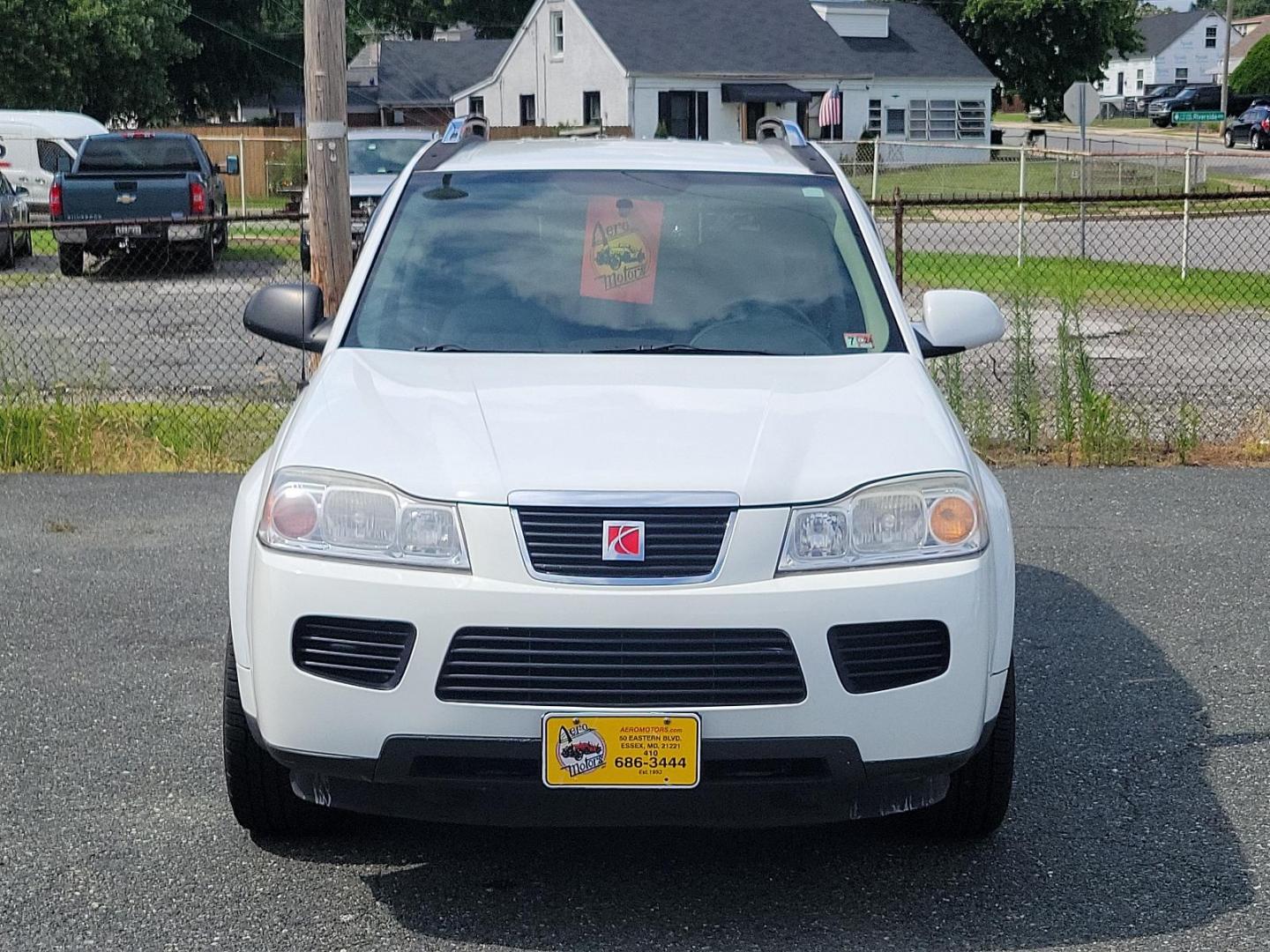 2007 Polar White - 50U /Gray - 17 Saturn VUE V6 (5GZCZ63477S) with an 3.5L SOHC MFI 24-VALVE V6 ENGINE engine, located at 50 Eastern Blvd., Essex, MD, 21221, (410) 686-3444, 39.304367, -76.484947 - Discover the elegance and comfort of the 2007 Saturn VUE V6 AWD 4dr V6 Auto. Dressed in a sophisticated Polar White exterior, this luxury SUV brings a whole new meaning to comfort and class. Its elegant Gray interior further enriches its distinctive aesthetics. Powered by a formidable 3.5L SOHC MFI - Photo#1