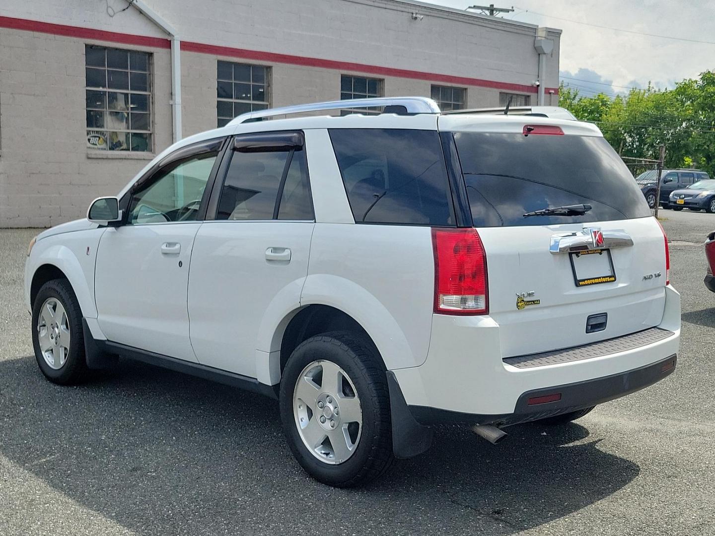 2007 Polar White - 50U /Gray - 17 Saturn VUE V6 (5GZCZ63477S) with an 3.5L SOHC MFI 24-VALVE V6 ENGINE engine, located at 50 Eastern Blvd., Essex, MD, 21221, (410) 686-3444, 39.304367, -76.484947 - Discover the elegance and comfort of the 2007 Saturn VUE V6 AWD 4dr V6 Auto. Dressed in a sophisticated Polar White exterior, this luxury SUV brings a whole new meaning to comfort and class. Its elegant Gray interior further enriches its distinctive aesthetics. Powered by a formidable 3.5L SOHC MFI - Photo#3