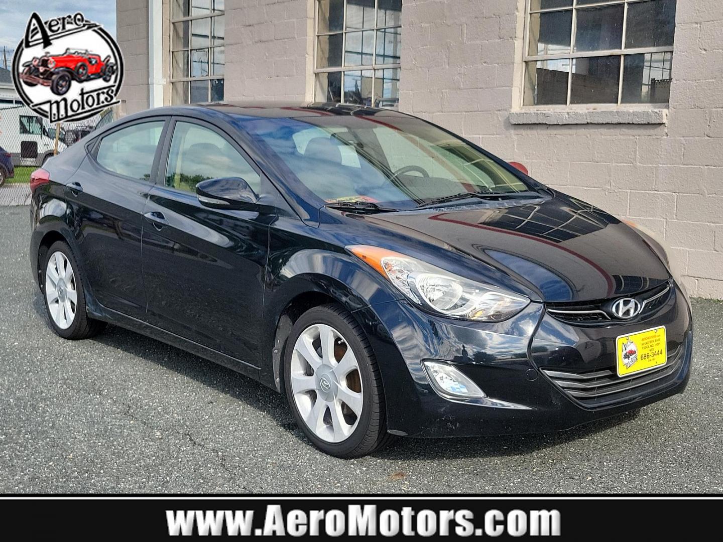 2011 Black Noir Pearl - NKA /Beige - YDA Hyundai Elantra Ltd (KMHDH4AE5BU) with an 1.8L DOHC MPFI D-CVVT 16-valve I4 engine engine, located at 50 Eastern Blvd., Essex, MD, 21221, (410) 686-3444, 39.304367, -76.484947 - Indulge in the premium driving experience offered by this 2011 Hyundai Elantra Ltd 4dr sdn auto ltd (ulsan plant), a symbol of sophisticated practicality. A captivating sight rests on its glossy Black Noir Pearl exterior that flawlessly complements its luxurious Beige interior. With its 1.8L DOHC MP - Photo#0