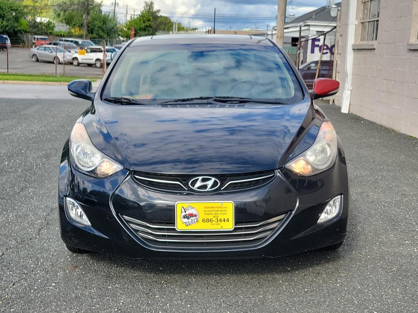 2011 Black Noir Pearl - NKA /Beige - YDA Hyundai Elantra Ltd (KMHDH4AE5BU) with an 1.8L DOHC MPFI D-CVVT 16-valve I4 engine engine, located at 50 Eastern Blvd., Essex, MD, 21221, (410) 686-3444, 39.304367, -76.484947 - Indulge in the premium driving experience offered by this 2011 Hyundai Elantra Ltd 4dr sdn auto ltd (ulsan plant), a symbol of sophisticated practicality. A captivating sight rests on its glossy Black Noir Pearl exterior that flawlessly complements its luxurious Beige interior. With its 1.8L DOHC MP - Photo#1