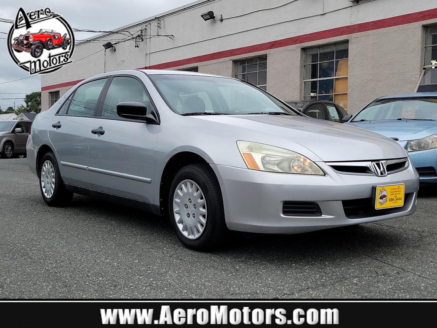 2006 Alabaster Silver Metallic - SI /Black - BK Honda Accord Sdn VP (1HGCM561X6A) with an 2.4L DOHC MPFI 16-valve i-VTEC I4 engine engine, located at 50 Eastern Blvd., Essex, MD, 21221, (410) 686-3444, 39.304367, -76.484947 - Presenting the 2006 Honda Accord Sdn VP, a blend of style, elegance and powerful performance, wrapped in a stunning grey exterior. This well-maintained mid-sized sedan comes with a robust 2.4L DOHC MPFI 16-Valve i-VTEC i4 engine that guarantees impressive on-road performance and remarkable fuel effi - Photo#0