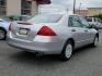 2006 Alabaster Silver Metallic - SI /Black - BK Honda Accord Sdn VP (1HGCM561X6A) with an 2.4L DOHC MPFI 16-valve i-VTEC I4 engine engine, located at 50 Eastern Blvd., Essex, MD, 21221, (410) 686-3444, 39.304367, -76.484947 - Presenting the 2006 Honda Accord Sdn VP, a blend of style, elegance and powerful performance, wrapped in a stunning grey exterior. This well-maintained mid-sized sedan comes with a robust 2.4L DOHC MPFI 16-Valve i-VTEC i4 engine that guarantees impressive on-road performance and remarkable fuel effi - Photo#5