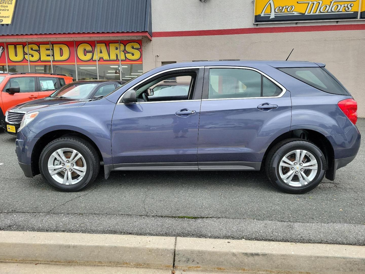 2013 Atlantis Blue Metallic /Jet Black - AFH Chevrolet Equinox LS (2GNALBEK2D6) with an ENGINE, 2.4L DOHC 4-CYLINDER SIDI (SPARK IGNITION DIRECT INJECTION) engine, located at 50 Eastern Blvd., Essex, MD, 21221, (410) 686-3444, 39.304367, -76.484947 - Make a bold statement with this exquisite 2013 Chevrolet Equinox LS FWD 4DR LS. Adorned with an alluring Atlantis Blue Metallic exterior and a sleek Jet Black interior, this vehicle redefines style and comfort in the auto industry. Under the hood, it houses a powerful 2.4L DOHC 4-Cylinder SIDI (Spar - Photo#3