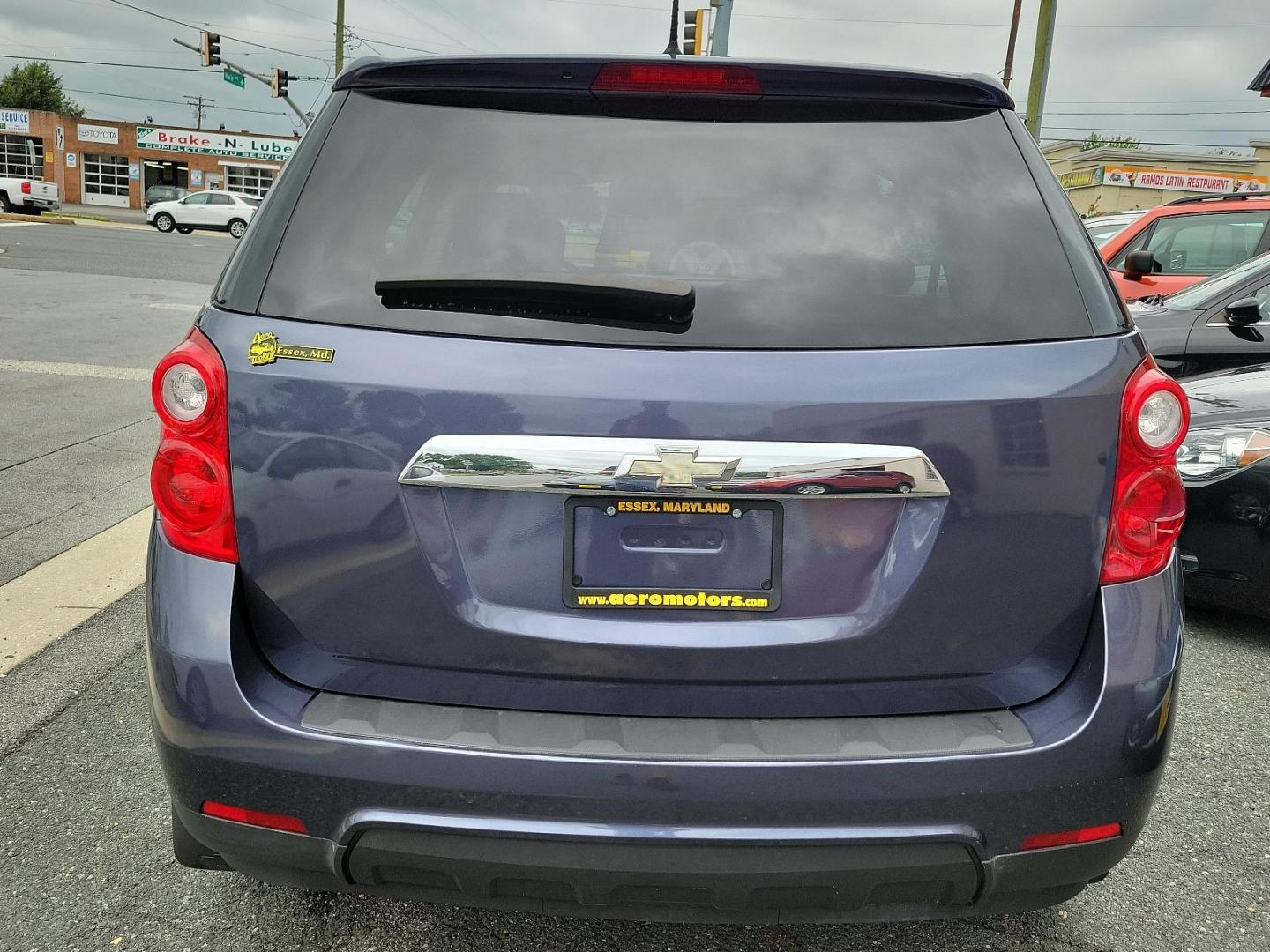 2013 Atlantis Blue Metallic /Jet Black - AFH Chevrolet Equinox LS (2GNALBEK2D6) with an ENGINE, 2.4L DOHC 4-CYLINDER SIDI (SPARK IGNITION DIRECT INJECTION) engine, located at 50 Eastern Blvd., Essex, MD, 21221, (410) 686-3444, 39.304367, -76.484947 - Make a bold statement with this exquisite 2013 Chevrolet Equinox LS FWD 4DR LS. Adorned with an alluring Atlantis Blue Metallic exterior and a sleek Jet Black interior, this vehicle redefines style and comfort in the auto industry. Under the hood, it houses a powerful 2.4L DOHC 4-Cylinder SIDI (Spar - Photo#5