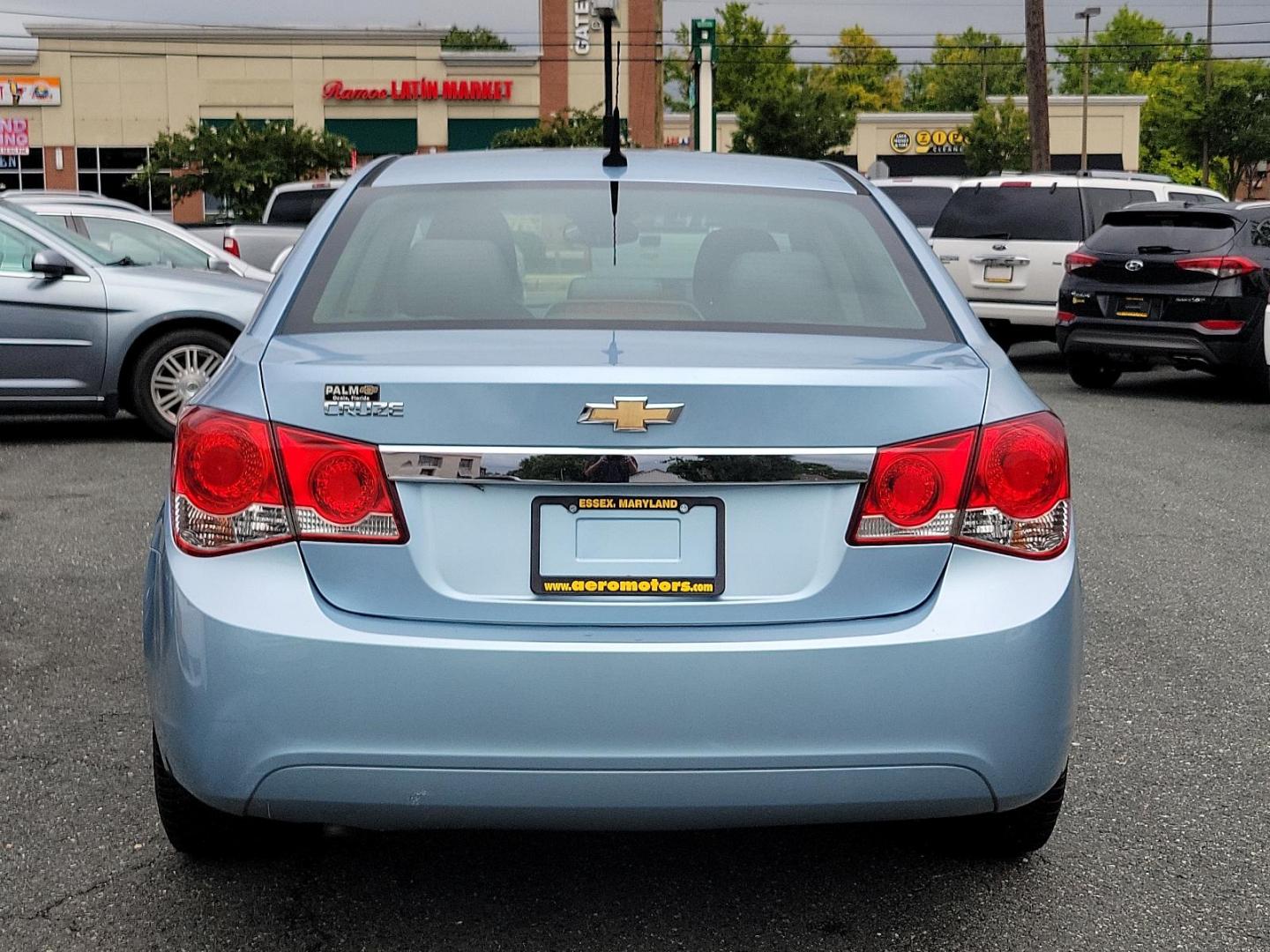 2011 Ice Blue Metallic - GLF /Jet Black/Medium Titanium - AFB Chevrolet Cruze LS (1G1PC5SH7B7) with an ENGINE, ECOTEC 1.8L VARIABLE VALVE TIMING DOHC 4-CYLINDER SEQUENTIAL MFI engine, located at 50 Eastern Blvd., Essex, MD, 21221, (410) 686-3444, 39.304367, -76.484947 - Immerse yourself in the captivating allure of this 2011 Chevrolet Cruze LS 4dr Sedan LS. Designed with a stylish Ice Blue Metallic exterior, it's sure to turn heads wherever it goes. The roomy inside, adorned with a tasteful Jet Black/Medium Titanium interior, blends sophistication and comfort to cr - Photo#4