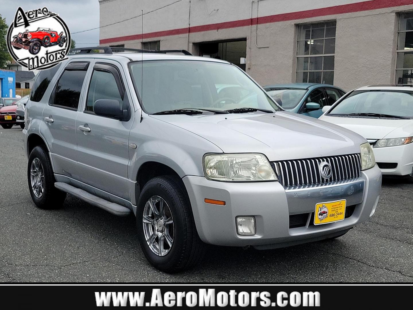 2005 Satellite Silver Metallic - T3 /Pebble/Lt Parch - H Mercury Mariner Premier (4M2CU57115D) with an 3.0L V6 "DURATEC" ENGINE engine, located at 50 Eastern Blvd., Essex, MD, 21221, (410) 686-3444, 39.304367, -76.484947 - Introducing the luxurious 2005 Mercury Mariner Premier 4dr 103" wb Premier 4WD. Displaying a sophisticated Satellite Silver Metallic - t3 exterior complemented beautifully with a classy Pebble/Lt Parch - h interior, this Mariner exemplifies elegance and style. Under the hood, you'll discover a power - Photo#0