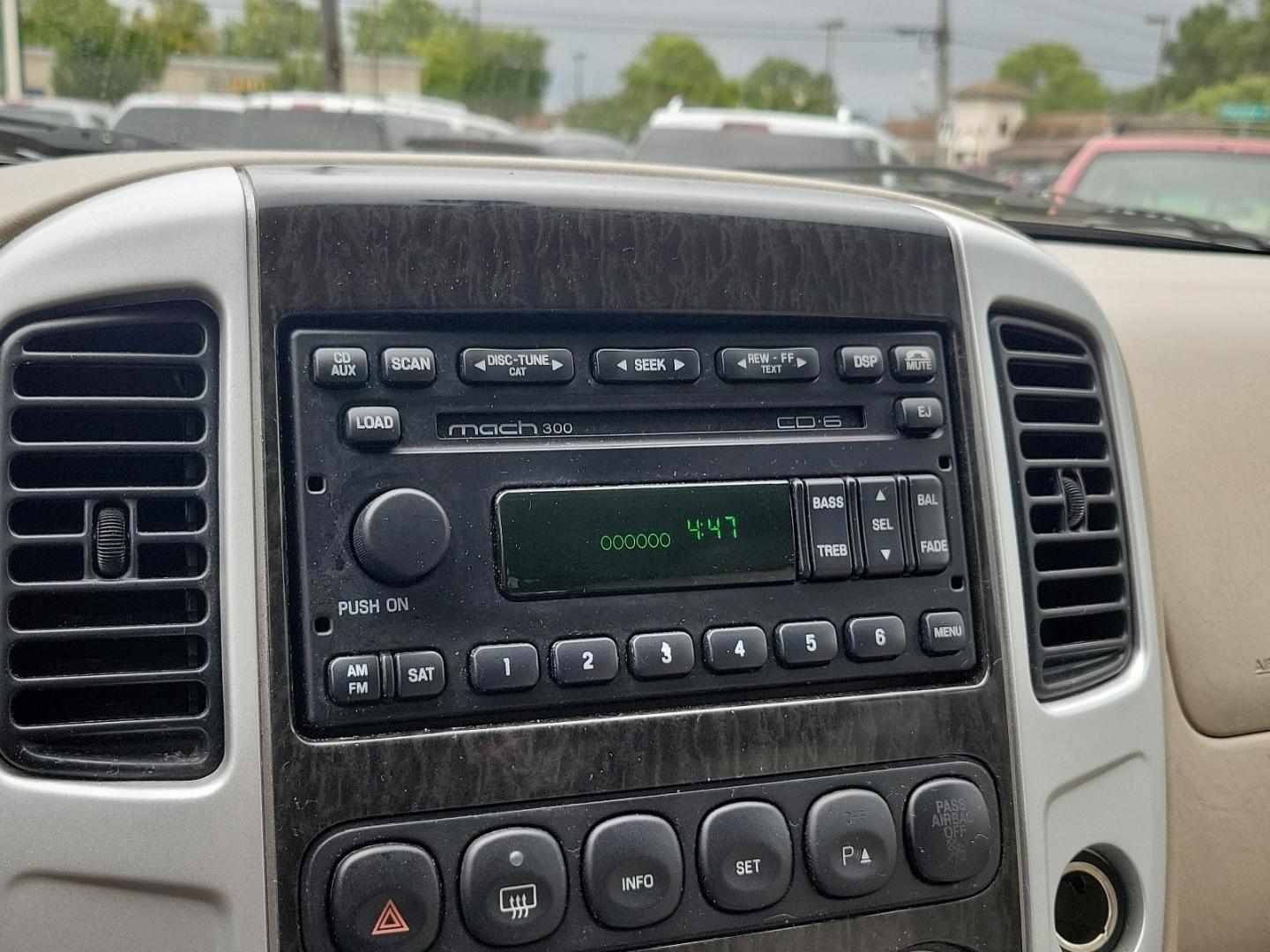 2005 Satellite Silver Metallic - T3 /Pebble/Lt Parch - H Mercury Mariner Premier (4M2CU57115D) with an 3.0L V6 "DURATEC" ENGINE engine, located at 50 Eastern Blvd., Essex, MD, 21221, (410) 686-3444, 39.304367, -76.484947 - Introducing the luxurious 2005 Mercury Mariner Premier 4dr 103" wb Premier 4WD. Displaying a sophisticated Satellite Silver Metallic - t3 exterior complemented beautifully with a classy Pebble/Lt Parch - h interior, this Mariner exemplifies elegance and style. Under the hood, you'll discover a power - Photo#13