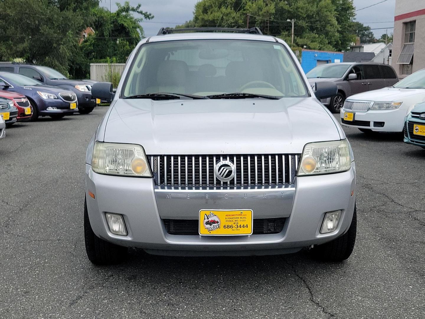 2005 Satellite Silver Metallic - T3 /Pebble/Lt Parch - H Mercury Mariner Premier (4M2CU57115D) with an 3.0L V6 "DURATEC" ENGINE engine, located at 50 Eastern Blvd., Essex, MD, 21221, (410) 686-3444, 39.304367, -76.484947 - Introducing the luxurious 2005 Mercury Mariner Premier 4dr 103" wb Premier 4WD. Displaying a sophisticated Satellite Silver Metallic - t3 exterior complemented beautifully with a classy Pebble/Lt Parch - h interior, this Mariner exemplifies elegance and style. Under the hood, you'll discover a power - Photo#1