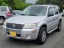 2005 Satellite Silver Metallic - T3 /Pebble/Lt Parch - H Mercury Mariner Premier (4M2CU57115D) with an 3.0L V6 "DURATEC" ENGINE engine, located at 50 Eastern Blvd., Essex, MD, 21221, (410) 686-3444, 39.304367, -76.484947 - Introducing the luxurious 2005 Mercury Mariner Premier 4dr 103" wb Premier 4WD. Displaying a sophisticated Satellite Silver Metallic - t3 exterior complemented beautifully with a classy Pebble/Lt Parch - h interior, this Mariner exemplifies elegance and style. Under the hood, you'll discover a power - Photo#2