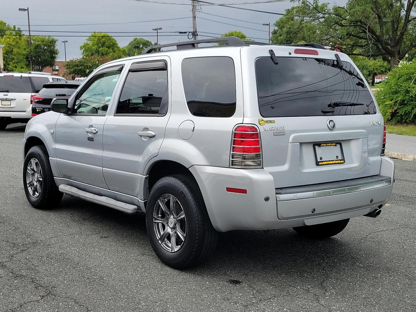 2005 Satellite Silver Metallic - T3 /Pebble/Lt Parch - H Mercury Mariner Premier (4M2CU57115D) with an 3.0L V6 "DURATEC" ENGINE engine, located at 50 Eastern Blvd., Essex, MD, 21221, (410) 686-3444, 39.304367, -76.484947 - Introducing the luxurious 2005 Mercury Mariner Premier 4dr 103" wb Premier 4WD. Displaying a sophisticated Satellite Silver Metallic - t3 exterior complemented beautifully with a classy Pebble/Lt Parch - h interior, this Mariner exemplifies elegance and style. Under the hood, you'll discover a power - Photo#3