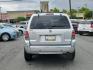 2005 Satellite Silver Metallic - T3 /Pebble/Lt Parch - H Mercury Mariner Premier (4M2CU57115D) with an 3.0L V6 "DURATEC" ENGINE engine, located at 50 Eastern Blvd., Essex, MD, 21221, (410) 686-3444, 39.304367, -76.484947 - Introducing the luxurious 2005 Mercury Mariner Premier 4dr 103" wb Premier 4WD. Displaying a sophisticated Satellite Silver Metallic - t3 exterior complemented beautifully with a classy Pebble/Lt Parch - h interior, this Mariner exemplifies elegance and style. Under the hood, you'll discover a power - Photo#4