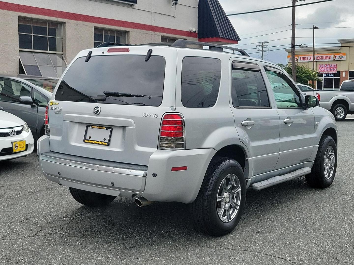 2005 Satellite Silver Metallic - T3 /Pebble/Lt Parch - H Mercury Mariner Premier (4M2CU57115D) with an 3.0L V6 "DURATEC" ENGINE engine, located at 50 Eastern Blvd., Essex, MD, 21221, (410) 686-3444, 39.304367, -76.484947 - Introducing the luxurious 2005 Mercury Mariner Premier 4dr 103" wb Premier 4WD. Displaying a sophisticated Satellite Silver Metallic - t3 exterior complemented beautifully with a classy Pebble/Lt Parch - h interior, this Mariner exemplifies elegance and style. Under the hood, you'll discover a power - Photo#5