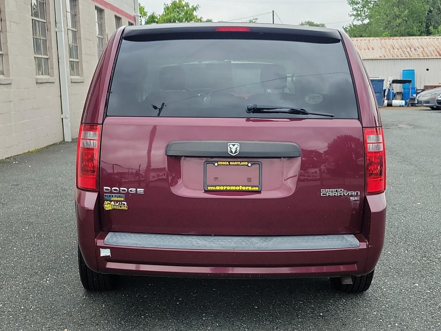 2009 Deep Crimson Crystal Pearl - PHF /Medium Slate/Light Shale - B7DS Dodge Grand Caravan SE (2D8HN44E59R) with an 3.3L OHV V6 ENGINE engine, located at 50 Eastern Blvd., Essex, MD, 21221, (410) 686-3444, 39.304367, -76.484947 - Introducing the 2009 Dodge Grand Caravan SE 4dr Wgn SE, a perfect harmony of space, comfort, and performance! Coated in a deep Crimson Crystal Pearl exterior flawlessly complementing a Medium Slate/Light Shale interior, this van offers a premium look that captures attention with every turn. Its hear - Photo#4