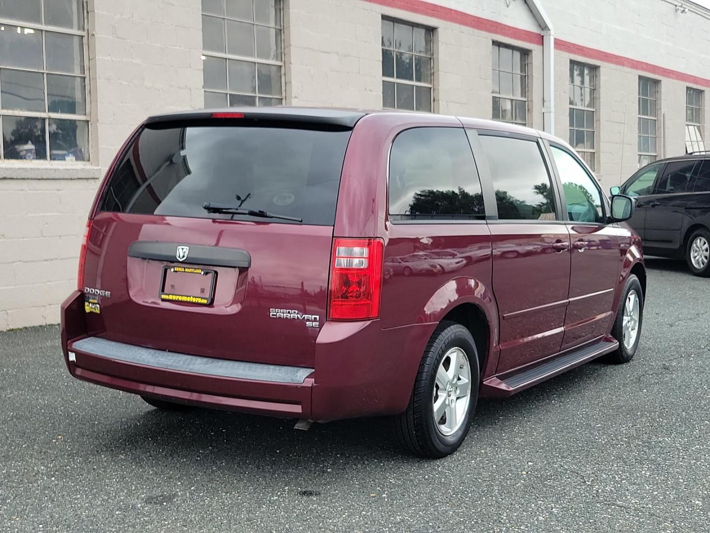 2009 Deep Crimson Crystal Pearl - PHF /Medium Slate/Light Shale - B7DS Dodge Grand Caravan SE (2D8HN44E59R) with an 3.3L OHV V6 ENGINE engine, located at 50 Eastern Blvd., Essex, MD, 21221, (410) 686-3444, 39.304367, -76.484947 - Introducing the 2009 Dodge Grand Caravan SE 4dr Wgn SE, a perfect harmony of space, comfort, and performance! Coated in a deep Crimson Crystal Pearl exterior flawlessly complementing a Medium Slate/Light Shale interior, this van offers a premium look that captures attention with every turn. Its hear - Photo#5