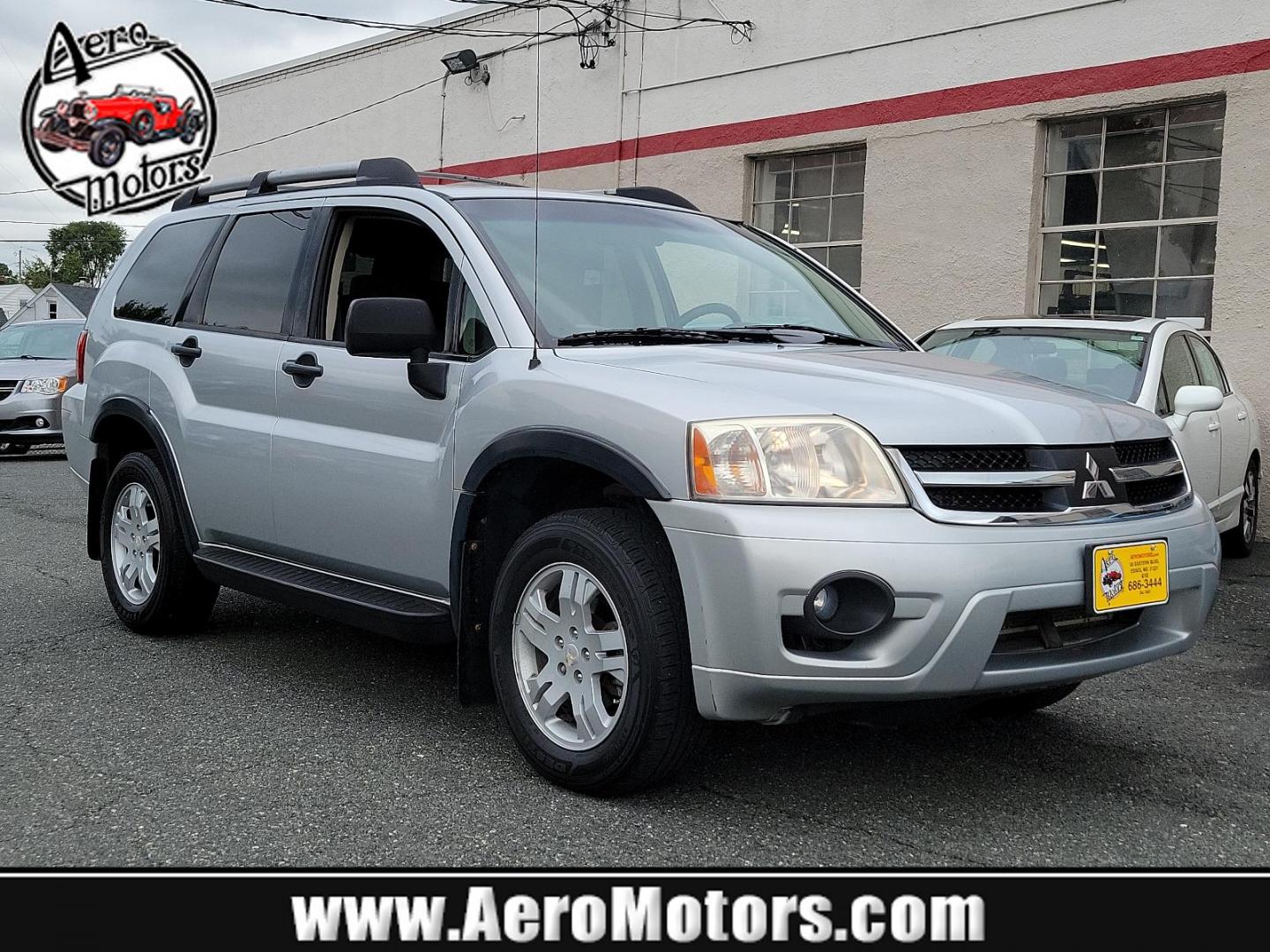 2007 Liquid Silver Metallic - A33 /Black - X Mitsubishi Endeavor LS (4A4MN21S67E) with an 3.8L SOHC SMPI 24-valve V6 engine engine, located at 50 Eastern Blvd., Essex, MD, 21221, (410) 686-3444, 39.304367, -76.484947 - Discover the perfect balance of power and reliability with this 2007 Mitsubishi Endeavor LS. Sculpted in an appealing silver exterior, this all-wheel-drive 4-door SUV is powered by a robust 3.8L SOHC SMPI 24-valve V6 engine that delivers captivating performance. This Mitsubishi Endeavor LS is renown - Photo#0