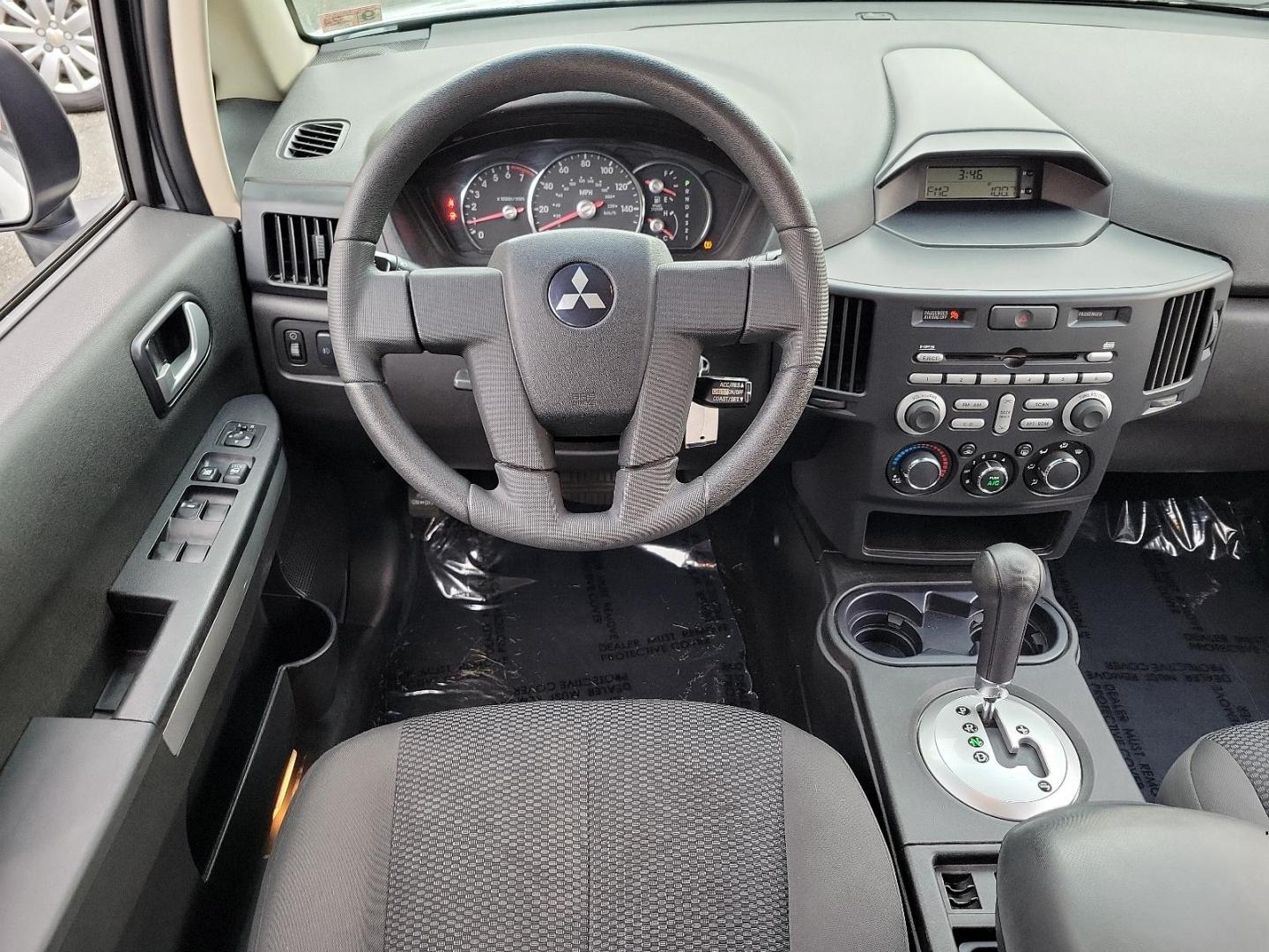 2007 Liquid Silver Metallic - A33 /Black - X Mitsubishi Endeavor LS (4A4MN21S67E) with an 3.8L SOHC SMPI 24-valve V6 engine engine, located at 50 Eastern Blvd., Essex, MD, 21221, (410) 686-3444, 39.304367, -76.484947 - Discover the perfect balance of power and reliability with this 2007 Mitsubishi Endeavor LS. Sculpted in an appealing silver exterior, this all-wheel-drive 4-door SUV is powered by a robust 3.8L SOHC SMPI 24-valve V6 engine that delivers captivating performance. This Mitsubishi Endeavor LS is renown - Photo#10