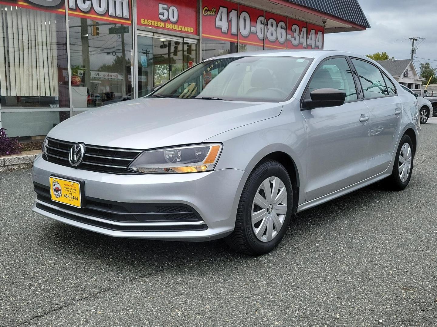 2015 Moonrock Silver Metallic - 0B0B /Titan Black - JM Volkswagen Jetta Sedan 2.0L S (3VW2K7AJ5FM) with an Engine: 2.0L I-4 SOHC engine, located at 50 Eastern Blvd., Essex, MD, 21221, (410) 686-3444, 39.304367, -76.484947 - Introducing the stunning 2015 Volkswagen Jetta Sedan 2.0L S, a refined representation of power and style. Finished in an attractive gray exterior, this 4-door vehicle is a striking combination of performance and efficiency. At its heart lies a robust 2.0L I-4 SOHC engine, offering dynamic handling a - Photo#2