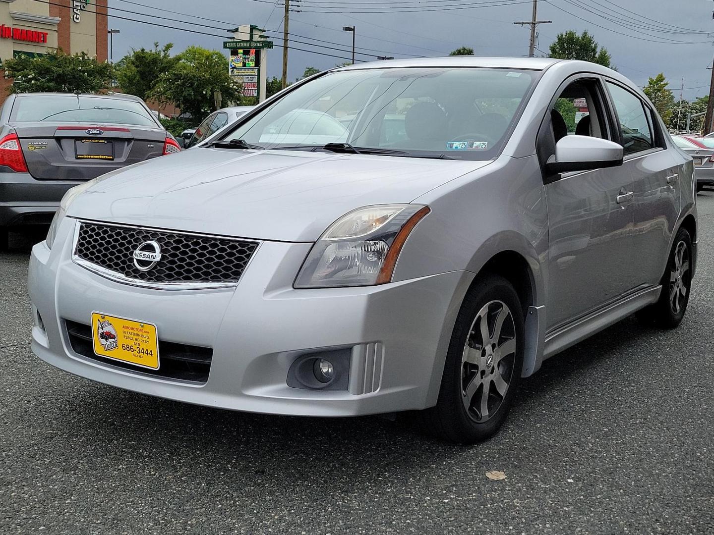 2011 Brilliant Silver /Charcoal - X Nissan Sentra 2.0 SR (3N1AB6APXBL) with an 2.0L DOHC 16-valve SMPI I4 engine engine, located at 50 Eastern Blvd., Essex, MD, 21221, (410) 686-3444, 39.304367, -76.484947 - Experience superior driving in this beautifully maintained 2011 Nissan Sentra 2.0 SR. This 4-door sedan features a powerful yet efficient 2.0L DOHC 16-valve SMPI I4 engine, guaranteeing smooth and responsive handling for all your on-road adventures. Its gorgeous brilliant silver exterior instantly c - Photo#2