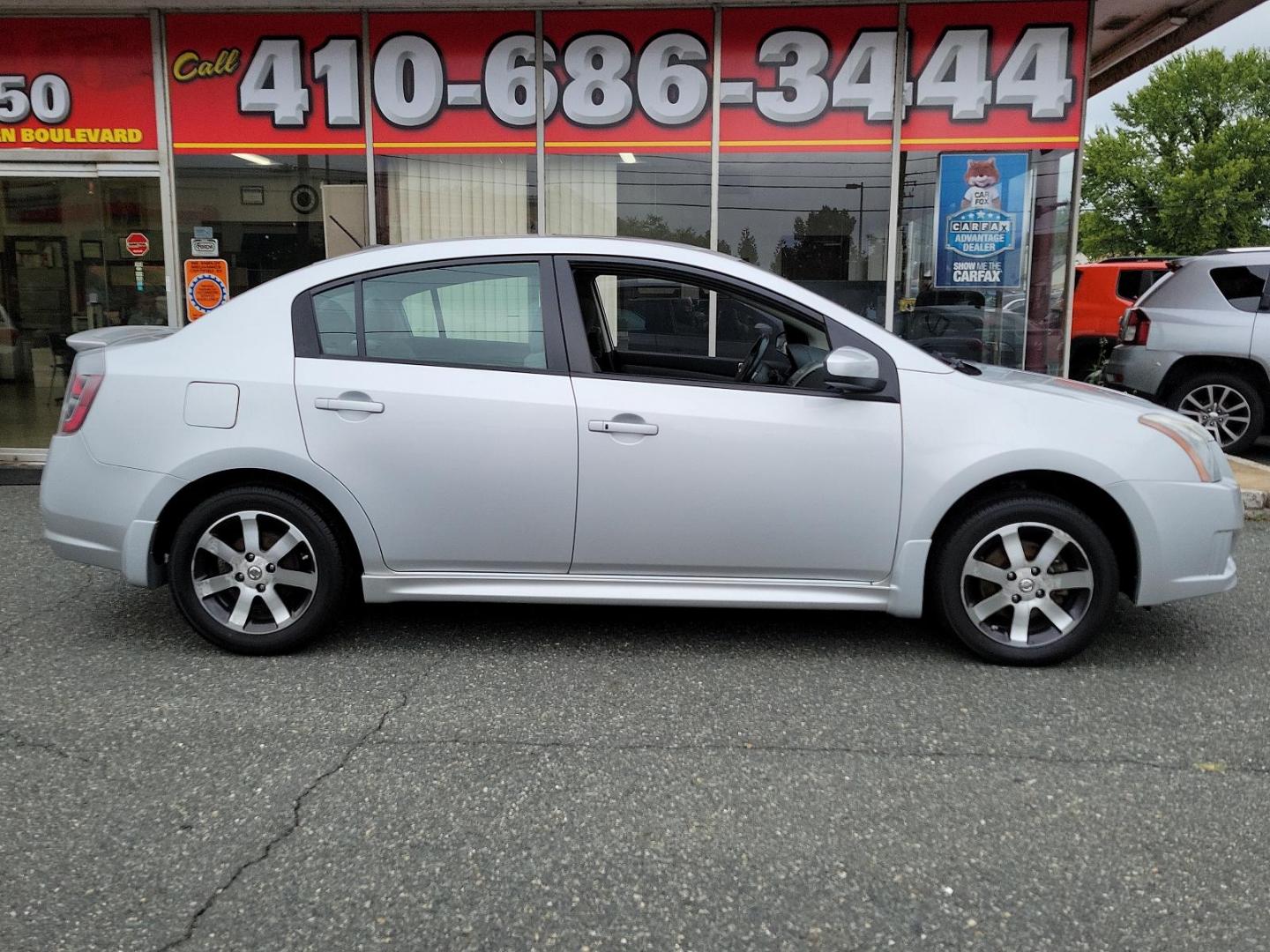 2011 Brilliant Silver /Charcoal - X Nissan Sentra 2.0 SR (3N1AB6APXBL) with an 2.0L DOHC 16-valve SMPI I4 engine engine, located at 50 Eastern Blvd., Essex, MD, 21221, (410) 686-3444, 39.304367, -76.484947 - Experience superior driving in this beautifully maintained 2011 Nissan Sentra 2.0 SR. This 4-door sedan features a powerful yet efficient 2.0L DOHC 16-valve SMPI I4 engine, guaranteeing smooth and responsive handling for all your on-road adventures. Its gorgeous brilliant silver exterior instantly c - Photo#6