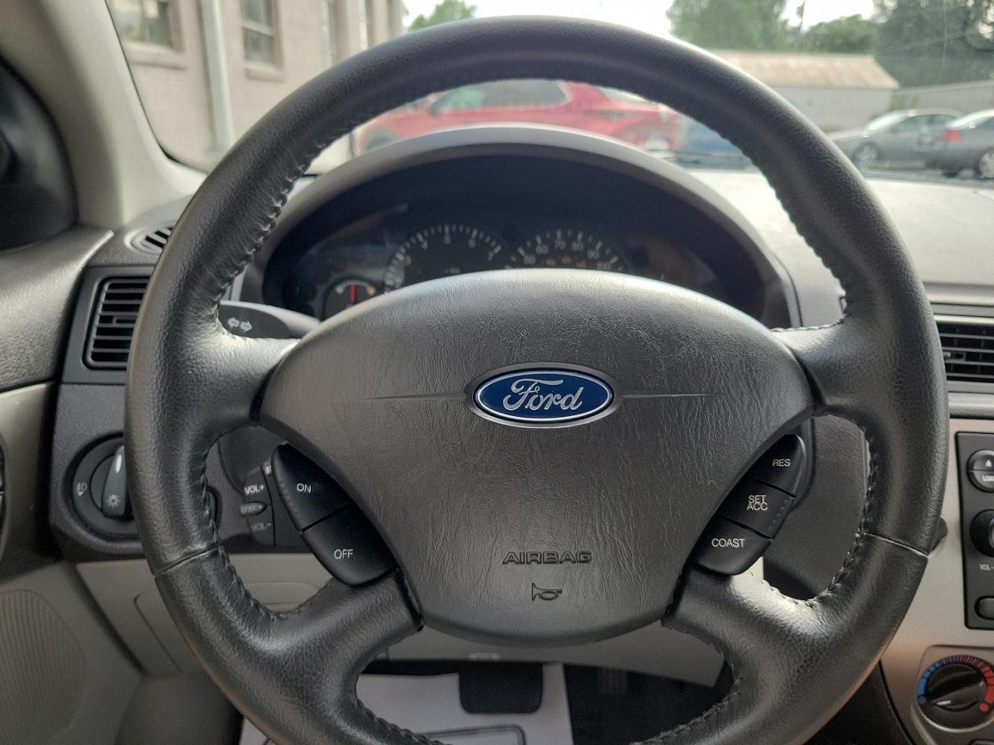 2007 Liquid Grey Metallic - CX /Dark Pebble/Light Pebble - P Ford Focus SES (1FAHP36N67W) with an 2.0L DOHC SMPI I4 DURATEC 20E ENGINE engine, located at 50 Eastern Blvd., Essex, MD, 21221, (410) 686-3444, 39.304367, -76.484947 - Step into excellent driving performance with this superb 2007 Ford Focus SES 4DR WGN SES *ltd avail*. Radiating in a stylish Liquid Grey Metallic - CX exterior, this vehicle boasts an immaculate Dark Pebble/Light Pebble - P interior that complements its overall aesthetic appeal. Powered by a robust - Photo#16