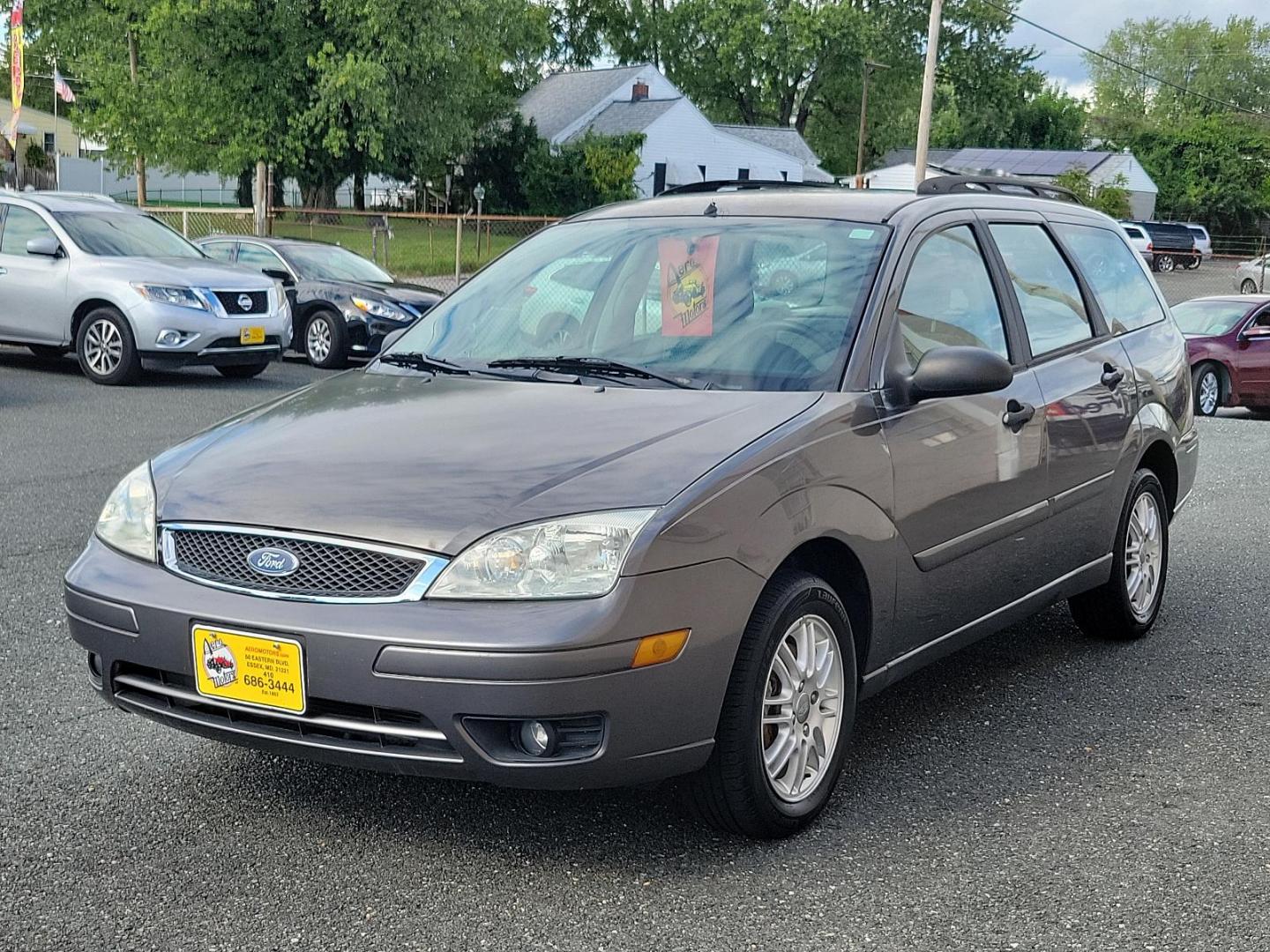 2007 Liquid Grey Metallic - CX /Dark Pebble/Light Pebble - P Ford Focus SES (1FAHP36N67W) with an 2.0L DOHC SMPI I4 DURATEC 20E ENGINE engine, located at 50 Eastern Blvd., Essex, MD, 21221, (410) 686-3444, 39.304367, -76.484947 - Step into excellent driving performance with this superb 2007 Ford Focus SES 4DR WGN SES *ltd avail*. Radiating in a stylish Liquid Grey Metallic - CX exterior, this vehicle boasts an immaculate Dark Pebble/Light Pebble - P interior that complements its overall aesthetic appeal. Powered by a robust - Photo#2