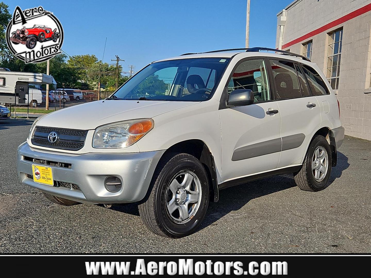 2005 Frosted White Pearl - 064 /Dark Charcoal - 11 Toyota RAV4 (JTEHD20V956) with an 2.4L DOHC SFI 16-valve VVT-i 4-cyl engine engine, located at 50 Eastern Blvd., Essex, MD, 21221, (410) 686-3444, 39.304367, -76.484947 - Enhance your driving experience with this impeccable 2005 Toyota RAV4, a 4-door automatic, featuring a sophisticated 4WD (natl). This efficient SUV stands out with its stunning Frosted White Pearl (064) exterior perfectly contrasted by a refined Dark Charcoal (11) interior. Under the hood, you'll fi - Photo#0