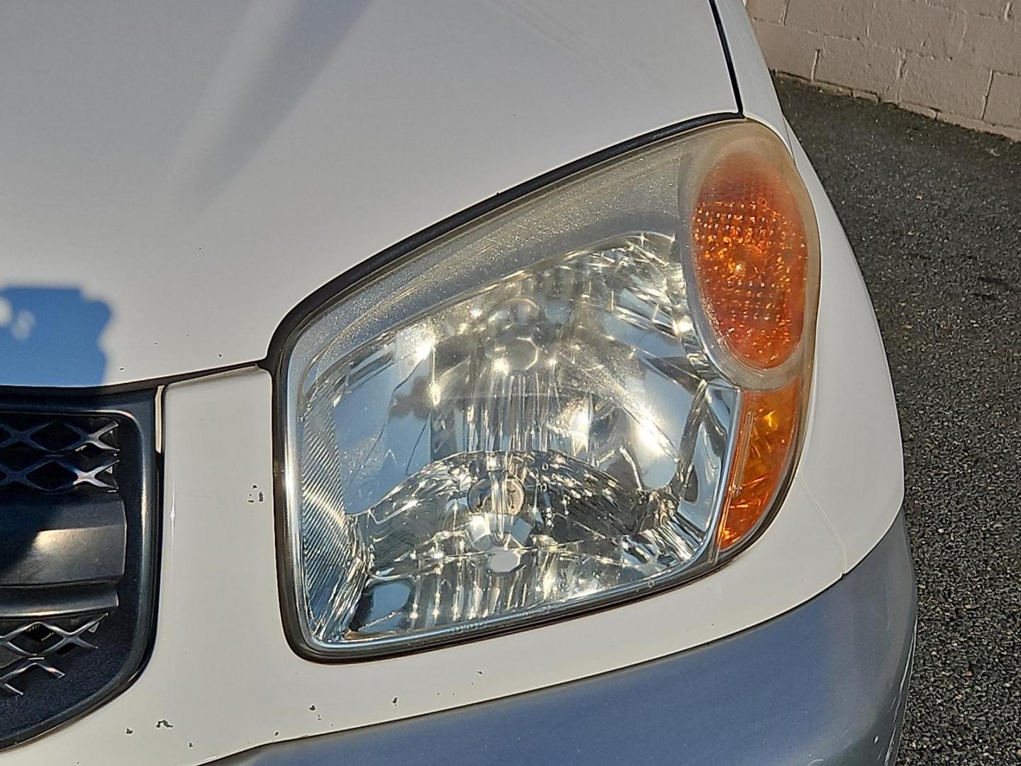 2005 Frosted White Pearl - 064 /Dark Charcoal - 11 Toyota RAV4 (JTEHD20V956) with an 2.4L DOHC SFI 16-valve VVT-i 4-cyl engine engine, located at 50 Eastern Blvd., Essex, MD, 21221, (410) 686-3444, 39.304367, -76.484947 - Enhance your driving experience with this impeccable 2005 Toyota RAV4, a 4-door automatic, featuring a sophisticated 4WD (natl). This efficient SUV stands out with its stunning Frosted White Pearl (064) exterior perfectly contrasted by a refined Dark Charcoal (11) interior. Under the hood, you'll fi - Photo#8