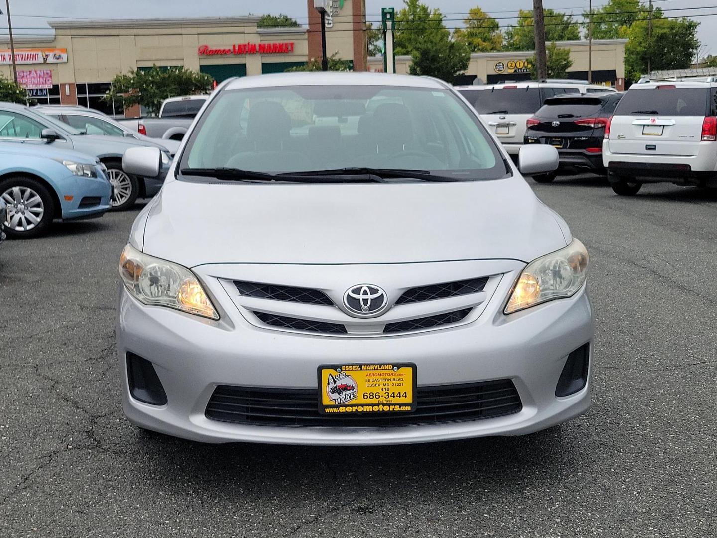 2012 Classic Silver Metallic - 1F7 /Ash - FB16 Toyota Corolla LE (2T1BU4EE1CC) with an 1.8L DOHC SFI 16-valve VVT-i I4 engine engine, located at 50 Eastern Blvd., Essex, MD, 21221, (410) 686-3444, 39.304367, -76.484947 - Introducing the sleek and dependable 2012 Toyota Corolla LE 4dr Sdn Auto LE (Natl), sporting a classic silver metallic - 1F7 exterior that accentuates its poised design. Nestled inside, the car features a clean and comfortable ash - FB16 interior, delivering a comfortable ride over any distance. Pow - Photo#1