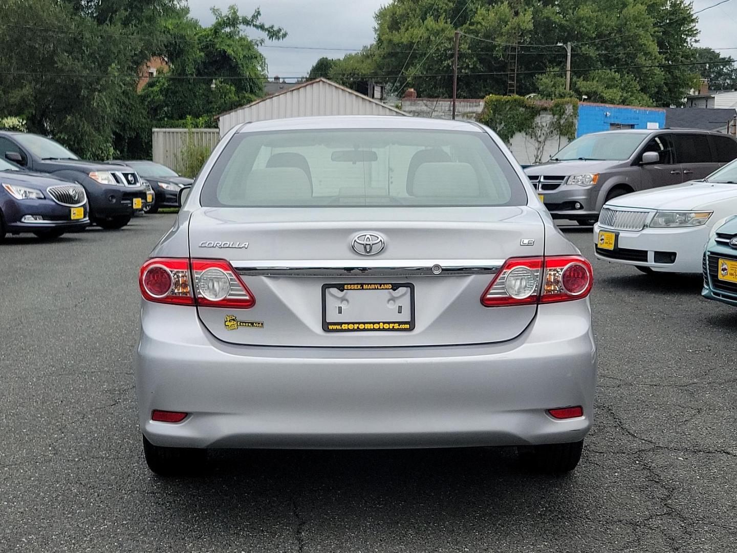 2012 Classic Silver Metallic - 1F7 /Ash - FB16 Toyota Corolla LE (2T1BU4EE1CC) with an 1.8L DOHC SFI 16-valve VVT-i I4 engine engine, located at 50 Eastern Blvd., Essex, MD, 21221, (410) 686-3444, 39.304367, -76.484947 - Introducing the sleek and dependable 2012 Toyota Corolla LE 4dr Sdn Auto LE (Natl), sporting a classic silver metallic - 1F7 exterior that accentuates its poised design. Nestled inside, the car features a clean and comfortable ash - FB16 interior, delivering a comfortable ride over any distance. Pow - Photo#4