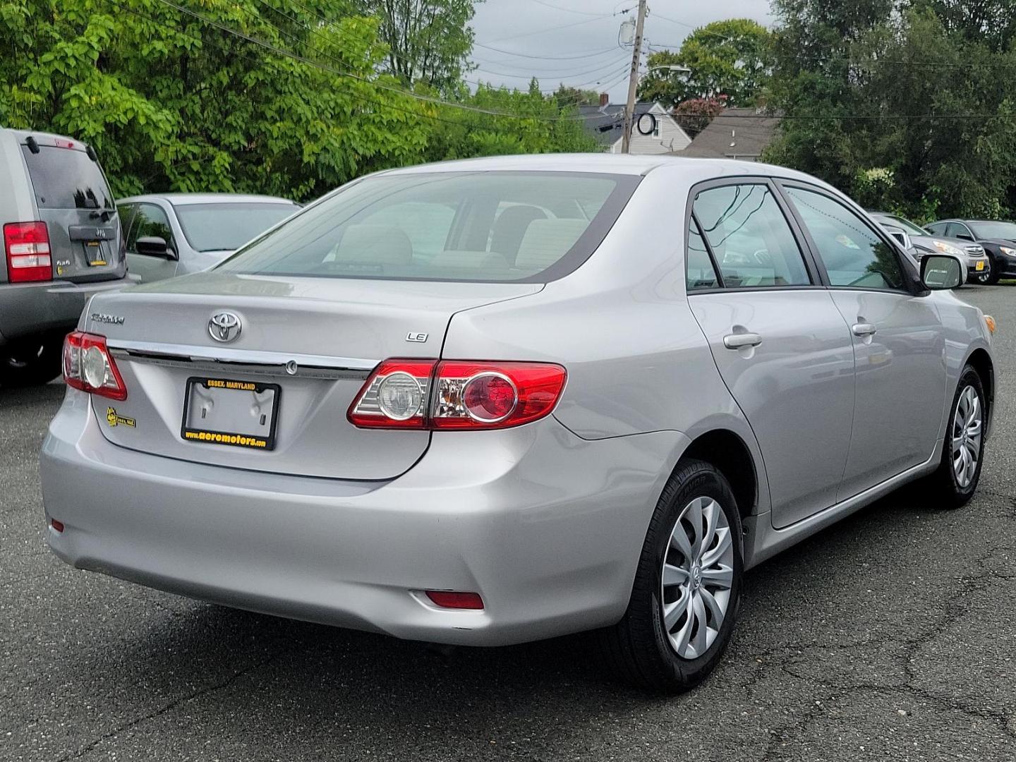 2012 Classic Silver Metallic - 1F7 /Ash - FB16 Toyota Corolla LE (2T1BU4EE1CC) with an 1.8L DOHC SFI 16-valve VVT-i I4 engine engine, located at 50 Eastern Blvd., Essex, MD, 21221, (410) 686-3444, 39.304367, -76.484947 - Introducing the sleek and dependable 2012 Toyota Corolla LE 4dr Sdn Auto LE (Natl), sporting a classic silver metallic - 1F7 exterior that accentuates its poised design. Nestled inside, the car features a clean and comfortable ash - FB16 interior, delivering a comfortable ride over any distance. Pow - Photo#5