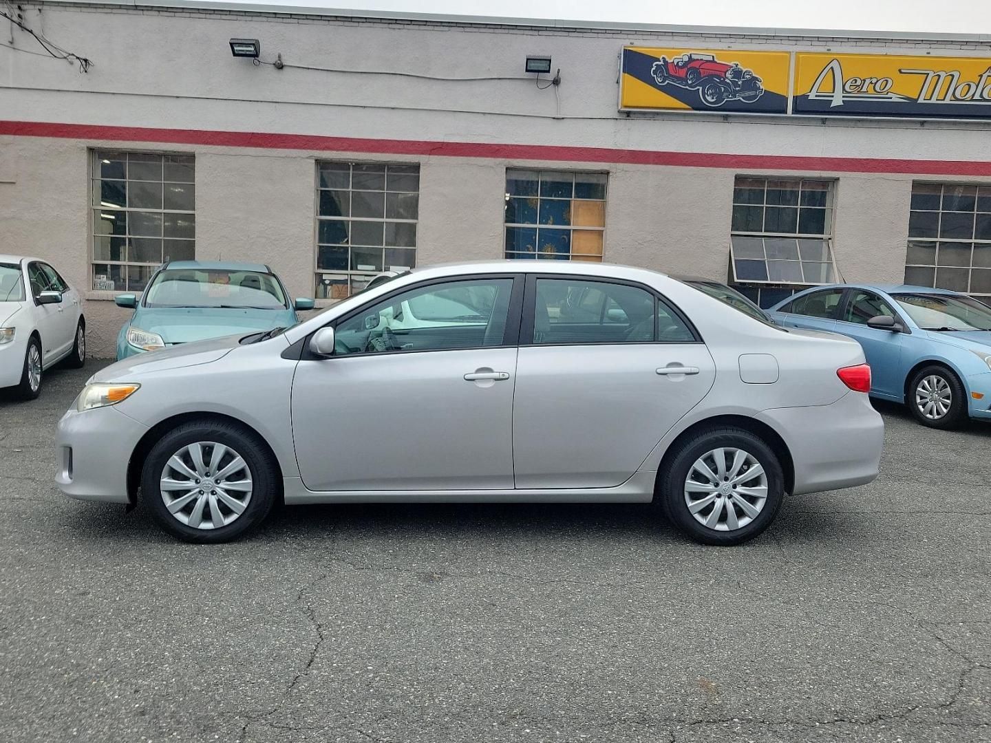 2012 Classic Silver Metallic - 1F7 /Ash - FB16 Toyota Corolla LE (2T1BU4EE1CC) with an 1.8L DOHC SFI 16-valve VVT-i I4 engine engine, located at 50 Eastern Blvd., Essex, MD, 21221, (410) 686-3444, 39.304367, -76.484947 - Introducing the sleek and dependable 2012 Toyota Corolla LE 4dr Sdn Auto LE (Natl), sporting a classic silver metallic - 1F7 exterior that accentuates its poised design. Nestled inside, the car features a clean and comfortable ash - FB16 interior, delivering a comfortable ride over any distance. Pow - Photo#6