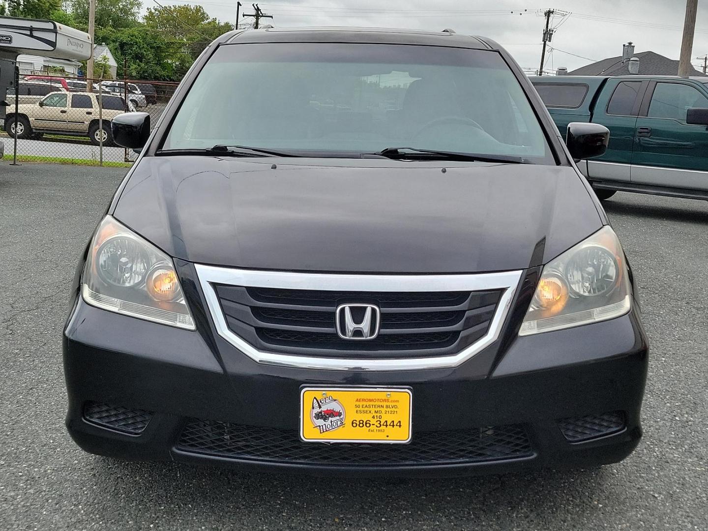 2010 Crystal Black Pearl - BX /Olive - OL Honda Odyssey EX-L (5FNRL3H67AB) with an 3.5L SOHC MPFI 24-valve i-VTEC V6 engine engine, located at 50 Eastern Blvd., Essex, MD, 21221, (410) 686-3444, 39.304367, -76.484947 - Introducing the elegantly built 2010 Honda Odyssey EX-L. Flaunting a sleek black exterior, this versatile minivan blends functionality and style. It's powered by a robust 3.5L SOHC MPFI 24-valve i-VTEC V6 Engine, delivering seamless performance and reliability with every journey. As a 5dr EX-L varia - Photo#1