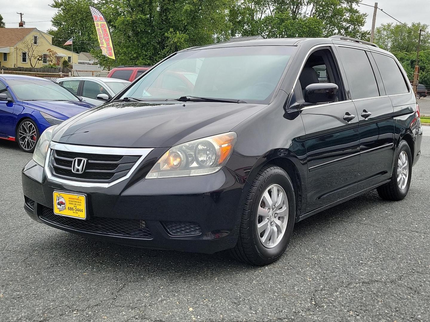 2010 Crystal Black Pearl - BX /Olive - OL Honda Odyssey EX-L (5FNRL3H67AB) with an 3.5L SOHC MPFI 24-valve i-VTEC V6 engine engine, located at 50 Eastern Blvd., Essex, MD, 21221, (410) 686-3444, 39.304367, -76.484947 - Introducing the elegantly built 2010 Honda Odyssey EX-L. Flaunting a sleek black exterior, this versatile minivan blends functionality and style. It's powered by a robust 3.5L SOHC MPFI 24-valve i-VTEC V6 Engine, delivering seamless performance and reliability with every journey. As a 5dr EX-L varia - Photo#2