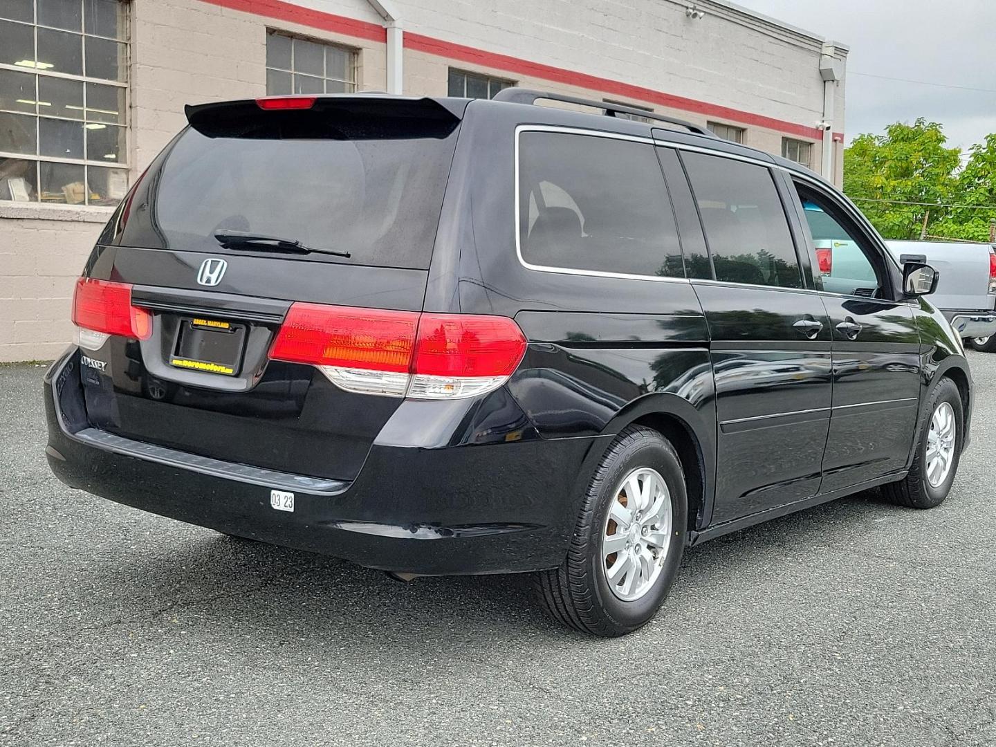 2010 Crystal Black Pearl - BX /Olive - OL Honda Odyssey EX-L (5FNRL3H67AB) with an 3.5L SOHC MPFI 24-valve i-VTEC V6 engine engine, located at 50 Eastern Blvd., Essex, MD, 21221, (410) 686-3444, 39.304367, -76.484947 - Introducing the elegantly built 2010 Honda Odyssey EX-L. Flaunting a sleek black exterior, this versatile minivan blends functionality and style. It's powered by a robust 3.5L SOHC MPFI 24-valve i-VTEC V6 Engine, delivering seamless performance and reliability with every journey. As a 5dr EX-L varia - Photo#5