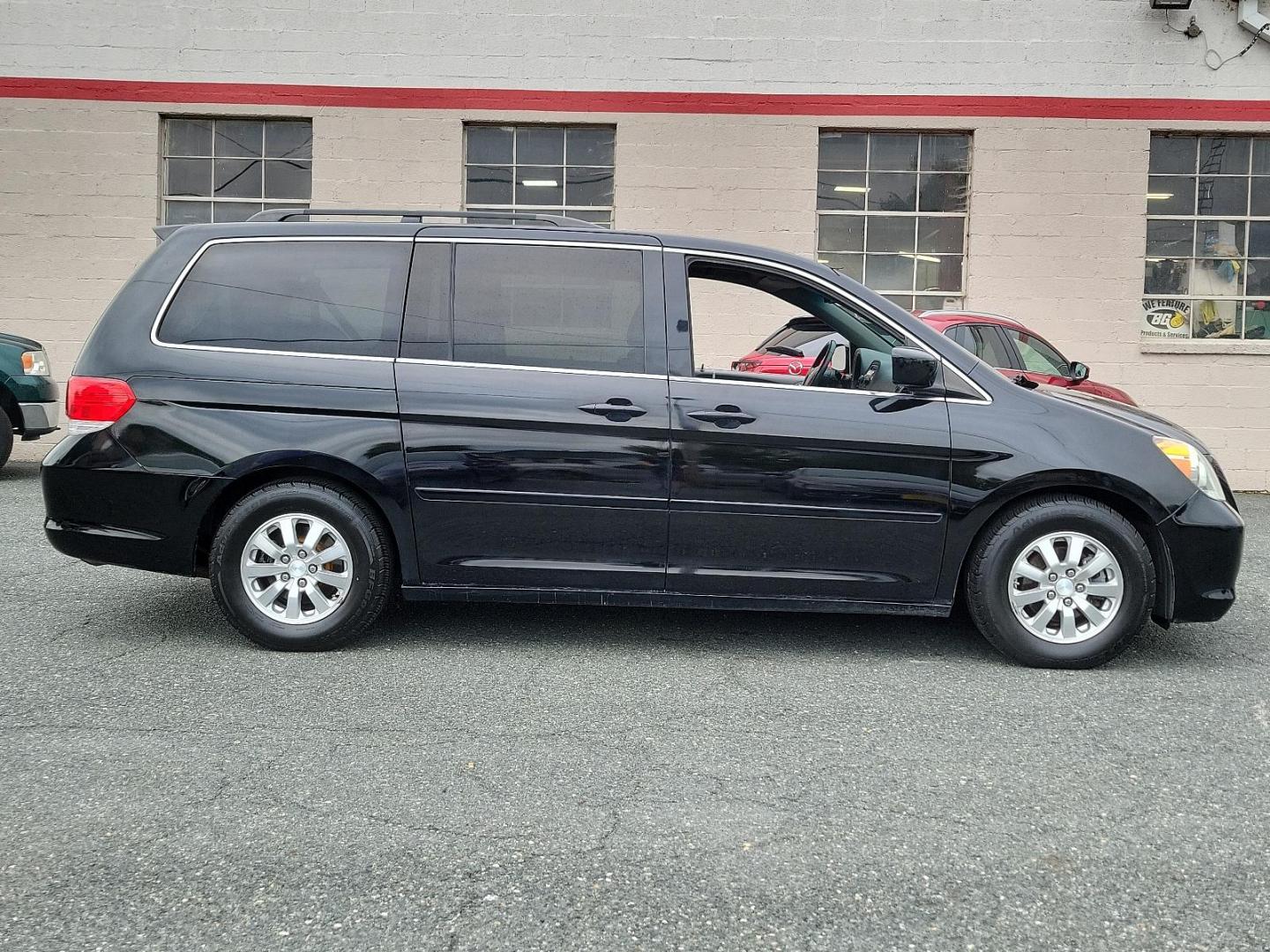 2010 Crystal Black Pearl - BX /Olive - OL Honda Odyssey EX-L (5FNRL3H67AB) with an 3.5L SOHC MPFI 24-valve i-VTEC V6 engine engine, located at 50 Eastern Blvd., Essex, MD, 21221, (410) 686-3444, 39.304367, -76.484947 - Introducing the elegantly built 2010 Honda Odyssey EX-L. Flaunting a sleek black exterior, this versatile minivan blends functionality and style. It's powered by a robust 3.5L SOHC MPFI 24-valve i-VTEC V6 Engine, delivering seamless performance and reliability with every journey. As a 5dr EX-L varia - Photo#6