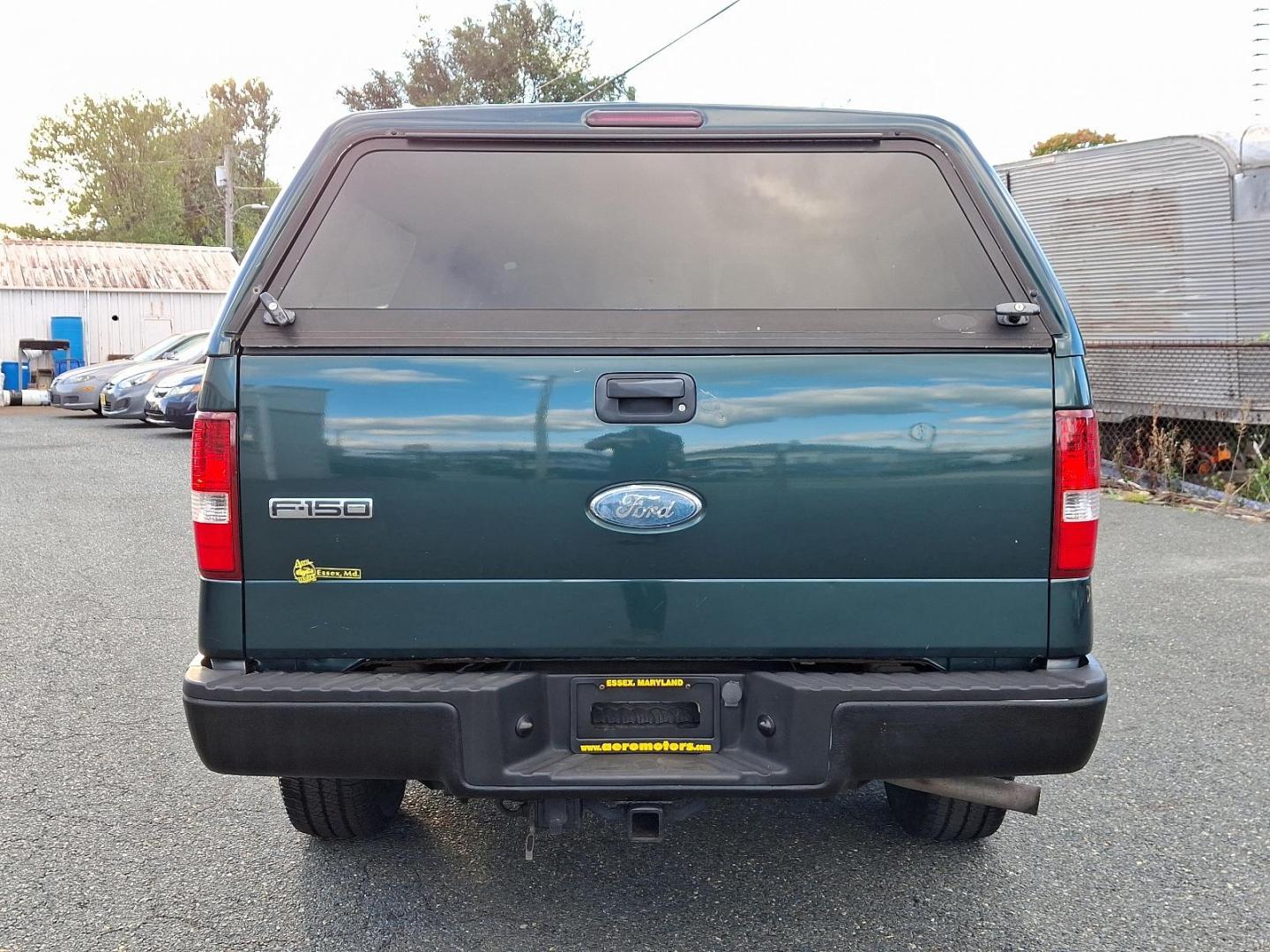 2007 Forest Green Metallic - GG /Black - B Ford F-150 XLT (1FTPX14V87F) with an 5.4L 24-VALVE EFI FFV V8 ENGINE engine, located at 50 Eastern Blvd., Essex, MD, 21221, (410) 686-3444, 39.304367, -76.484947 - Experience robust performance and rugged durability with our stunning 2007 Ford F-150, finished in a vibrant, green exterior that commands attention on the road! Engineered for longevity and reliability, this Ford model stands out in the full-size pickup truck segment, boasting commendable towing an - Photo#4