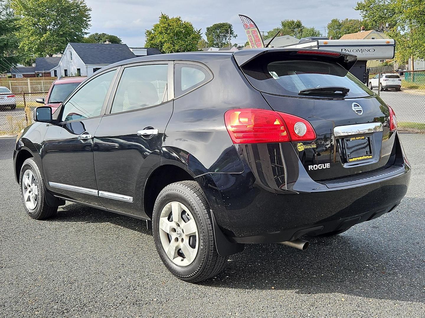 2012 Super Black - KH3 /Black - G Nissan Rogue S (JN8AS5MT0CW) with an 2.5L DOHC SMPI 16-valve I4 engine engine, located at 50 Eastern Blvd., Essex, MD, 21221, (410) 686-3444, 39.304367, -76.484947 - Presenting a superb 2012 Nissan Rogue S fwd 4dr s, beautifully finished in classic Super Black exterior matched with an elegant black interior. This dynamic SUV pulses with strength, driven by a 2.5l dohc smpi 16-valve i4 engine that masterfully balances power and fuel efficiency. The performance is - Photo#5