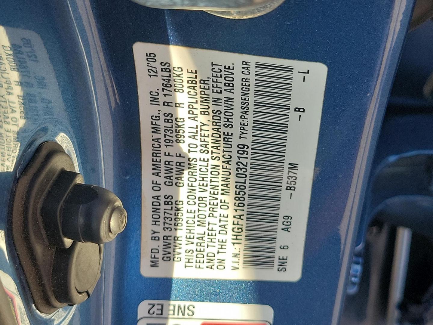 2006 Royal Blue Pearl - BL /Gray - GR Honda Civic Sdn EX (1HGFA16856L) with an 1.8L SOHC MPFI 16-valve i-VTEC I4 engine engine, located at 50 Eastern Blvd., Essex, MD, 21221, (410) 686-3444, 39.304367, -76.484947 - Featuring a 2006 Honda Civic Sdn EX ex AT draped in a stunning Royal Blue Pearl exterior and accented with a Gray interior. Equipped with a robust 1.8L SOHC MPFI 16-valve i-VTEC i4 engine, this powerhouse delivers a dynamic driving experience coupled with reliability, making each journey you embark - Photo#19