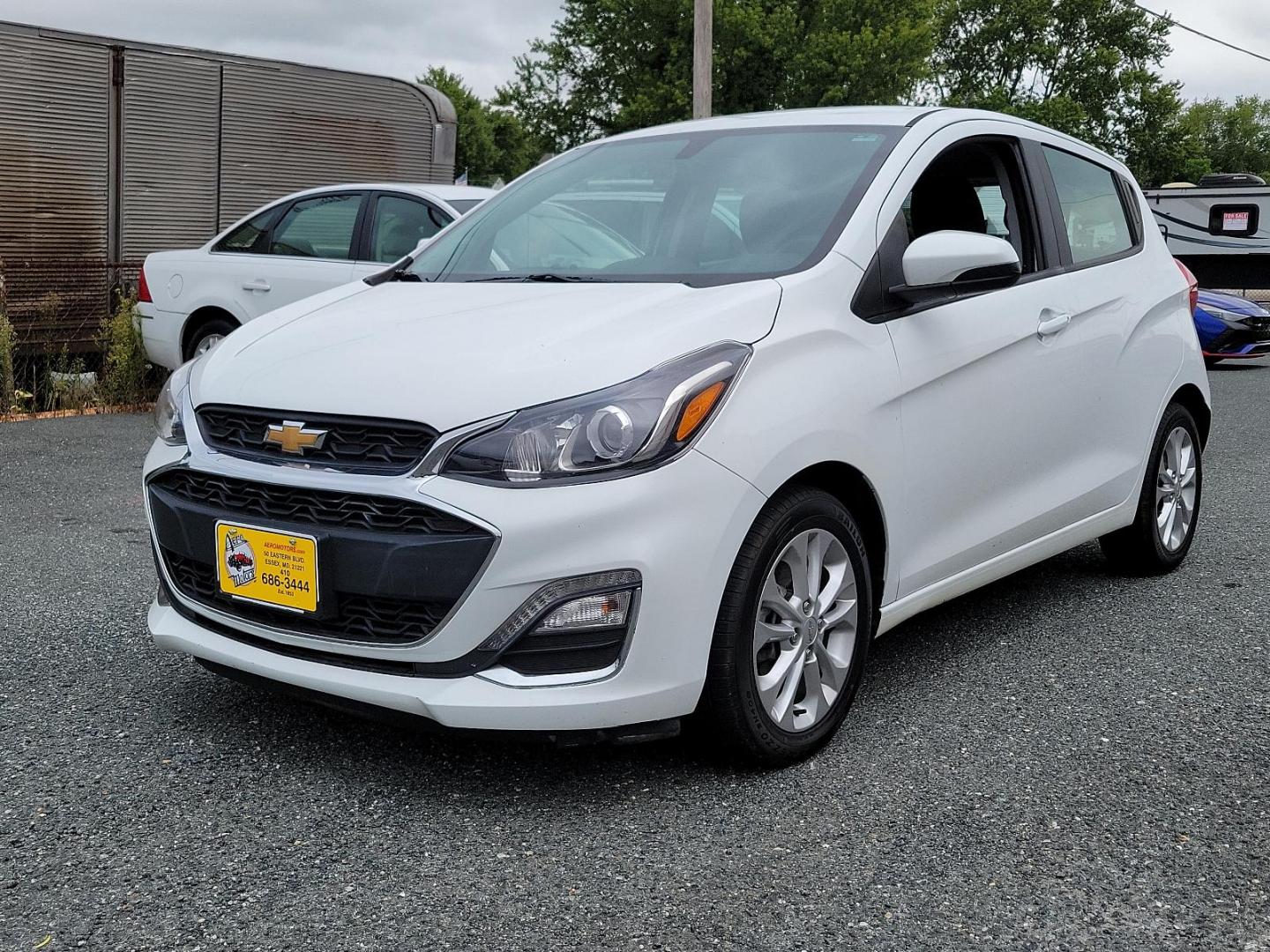 2021 Summit White - GAZ /Jet Black/Dark Anderson Silver Metallic - HJG Chevrolet Spark 1LT (KL8CD6SAXMC) with an ENGINE, 1.4L DOHC 4-CYLINDER MFI engine, located at 50 Eastern Blvd., Essex, MD, 21221, (410) 686-3444, 39.304367, -76.484947 - Experience the ultimate blend of style, comfort, and affordability with the 2021 Chevrolet Spark 1LT 4dr HB CVT 1LT. This sleek, Summit White exterior vehicle is matched perfectly with a Jet Black/Dark Anderson Silver Metallic interior, exuding class and refinement. Under the hood lies a 1.4L DOHC 4 - Photo#2