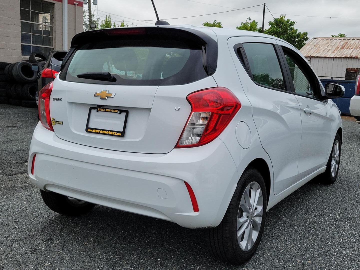 2021 Summit White - GAZ /Jet Black/Dark Anderson Silver Metallic - HJG Chevrolet Spark 1LT (KL8CD6SAXMC) with an ENGINE, 1.4L DOHC 4-CYLINDER MFI engine, located at 50 Eastern Blvd., Essex, MD, 21221, (410) 686-3444, 39.304367, -76.484947 - Experience the ultimate blend of style, comfort, and affordability with the 2021 Chevrolet Spark 1LT 4dr HB CVT 1LT. This sleek, Summit White exterior vehicle is matched perfectly with a Jet Black/Dark Anderson Silver Metallic interior, exuding class and refinement. Under the hood lies a 1.4L DOHC 4 - Photo#5