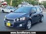 2014 Black Granite Metallic - GAR /Dark Pewter/Dark Titanium - ADP Chevrolet Sonic LTZ (1G1JE6SB3E4) with an ENGINE, ECOTEC TURBO 1.4L VARIABLE VALVE TIMING DOHC 4-CYLINDER SEQUENTIAL MFI engine, located at 50 Eastern Blvd., Essex, MD, 21221, (410) 686-3444, 39.304367, -76.484947 - Discover the outstanding 2014 Chevrolet Sonic LTZ 5-Door Hatchback Auto LTZ - an embodiment of power and style. Coated in a sleek Black Granite Metallic exterior coupled with a sophisticated Dark Pewter/Dark Titanium interior, this vehicle combines aesthetics with quality. Under the hood, nestled pe - Photo#0